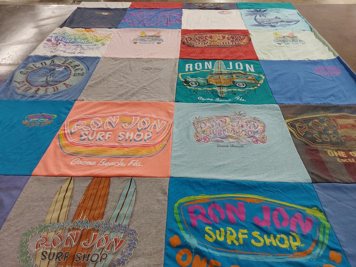 T-shirt quilt with surfing, beach activities themes by Colette from OR