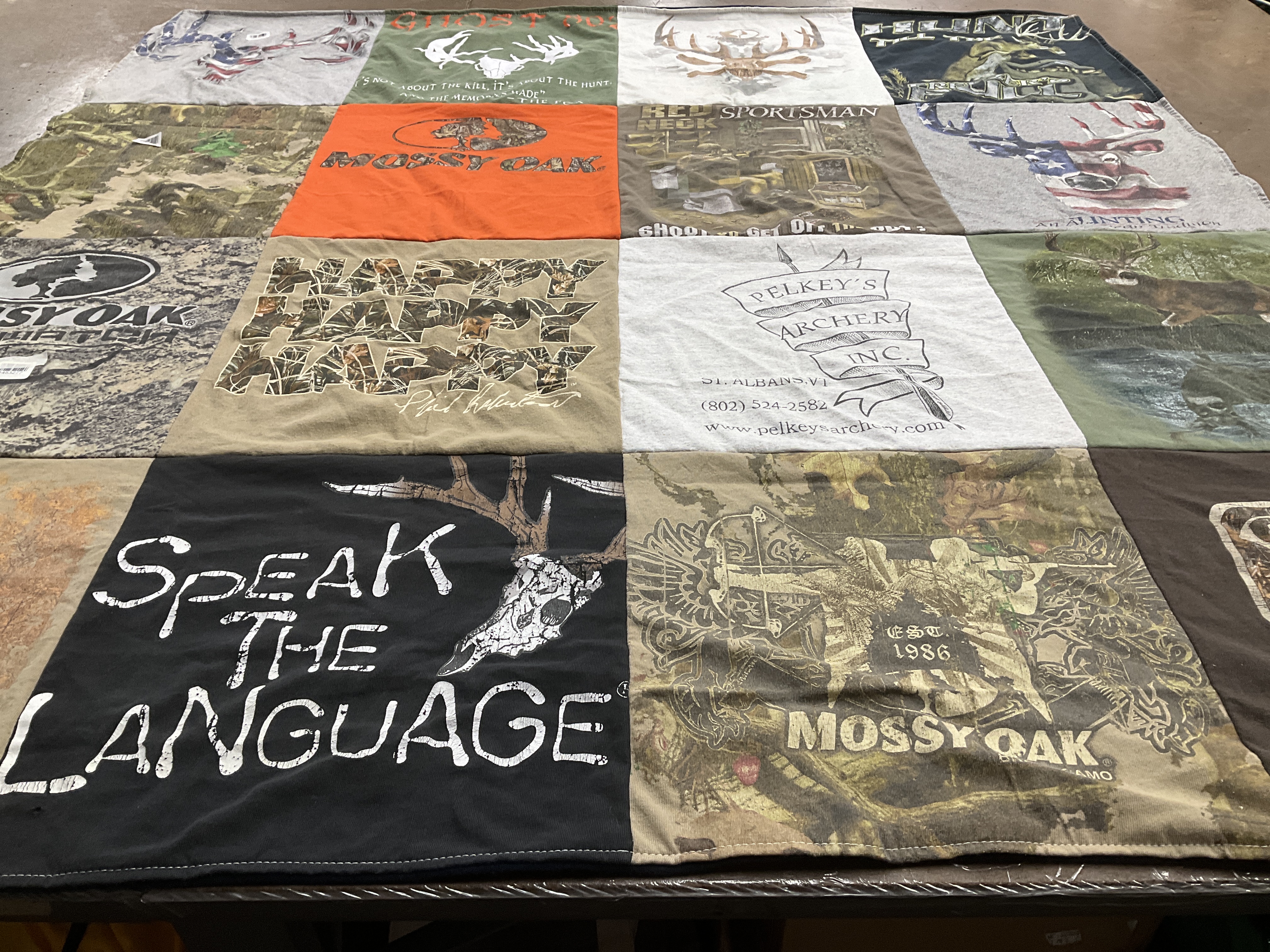 T-shirt quilt with hunting, archery themes by Jenn from VT