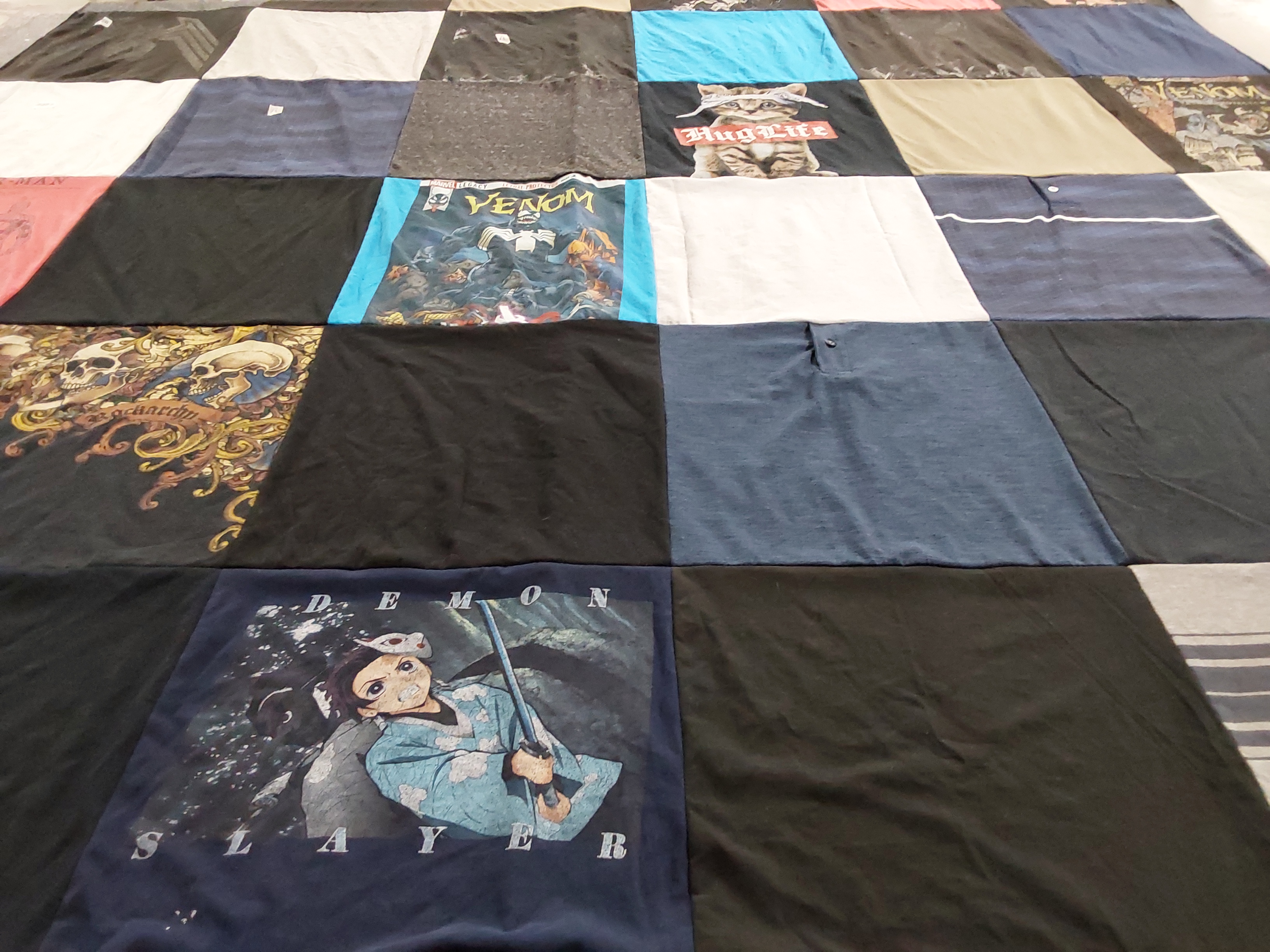 T-shirt quilt with anime, comics themes by Magen from SC