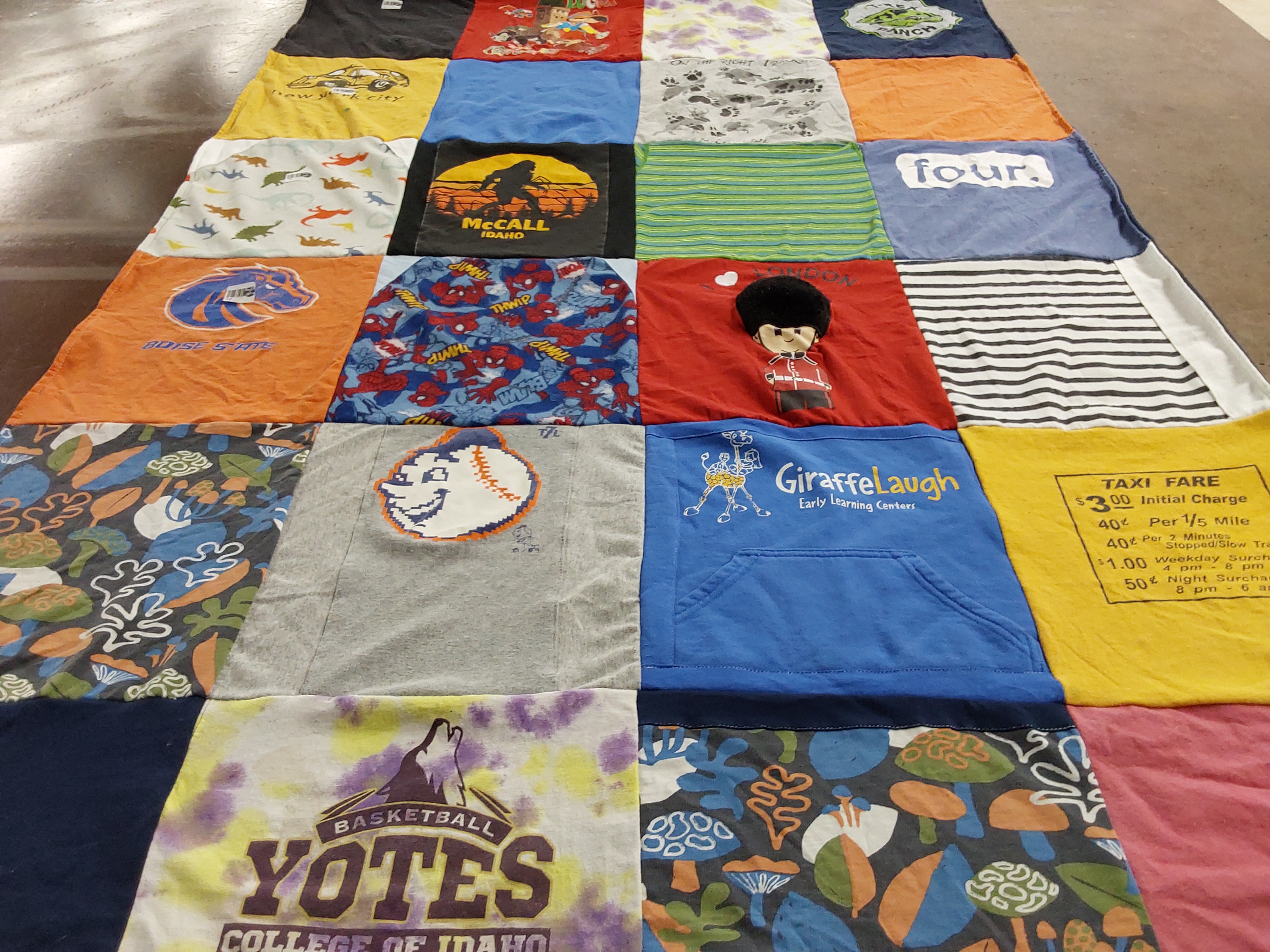 Custom Project Repat t-shirt quilt featuring shirts from college of idaho.