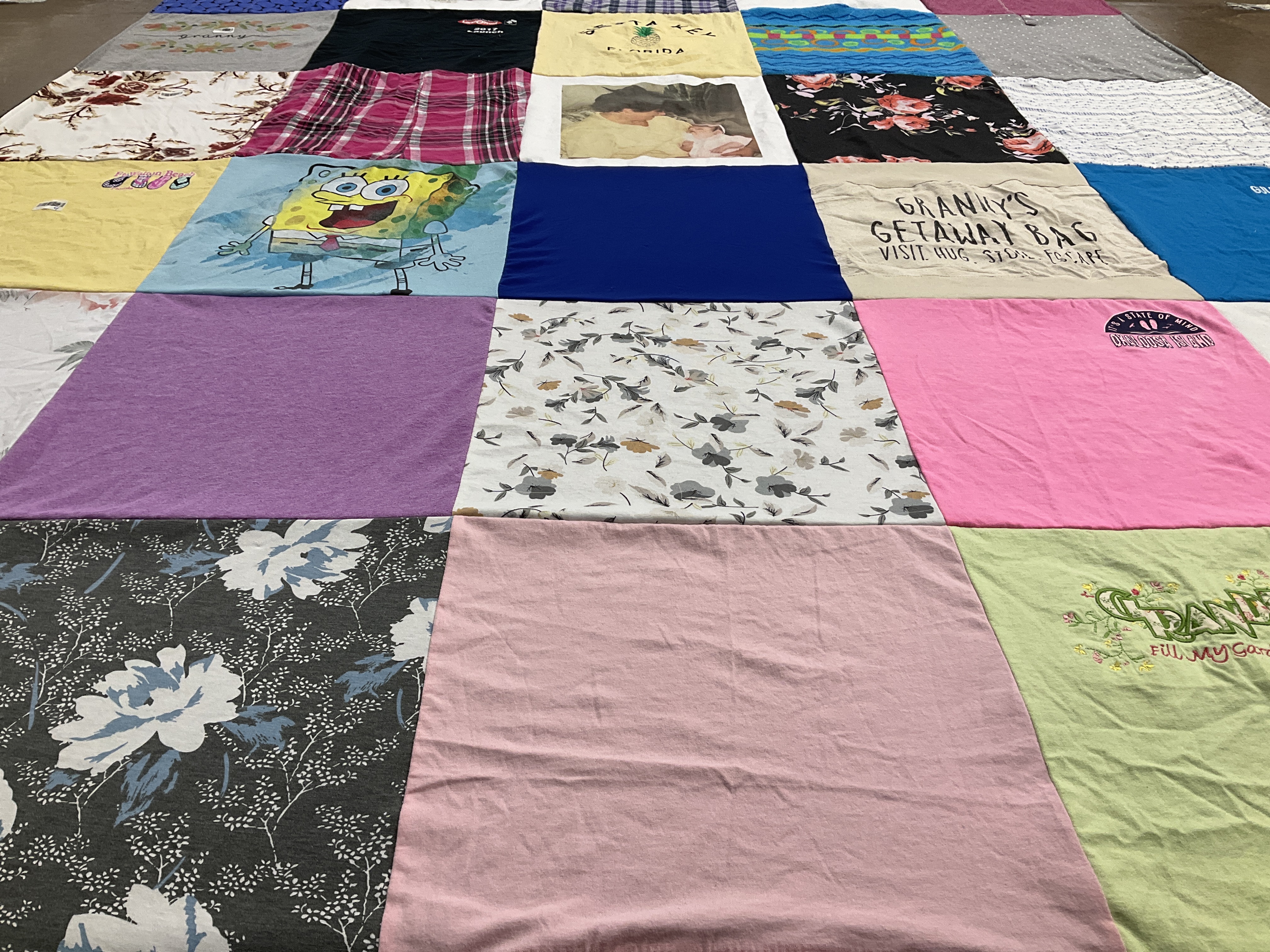 T-shirt quilt with cartoons, travel themes by Tonya from KY