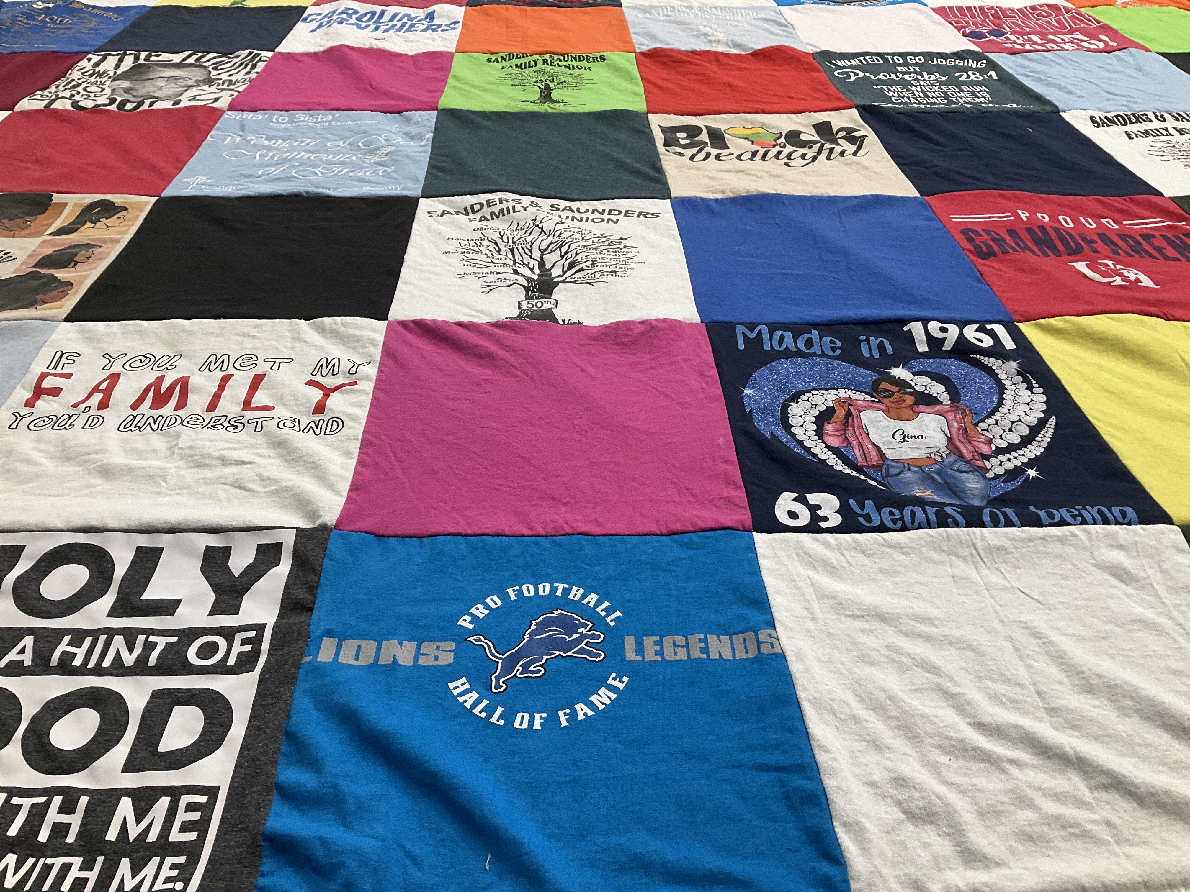 T-shirt quilt with family, sports themes by Gina from NC