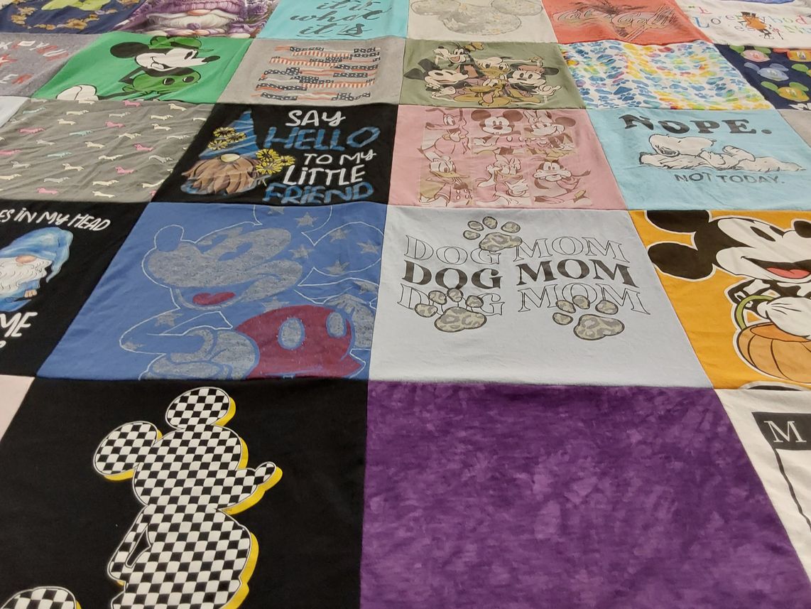 T-shirt quilt with dogs, disney themes by Pamela from MI