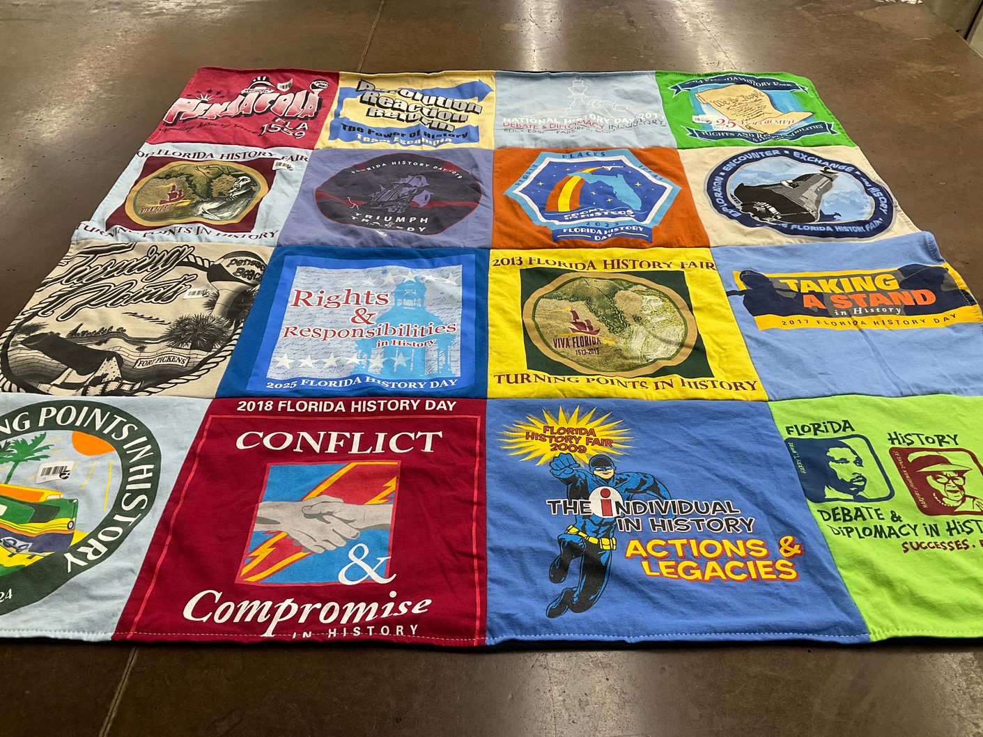 T-shirt quilt with history, education themes by Cherie from FL