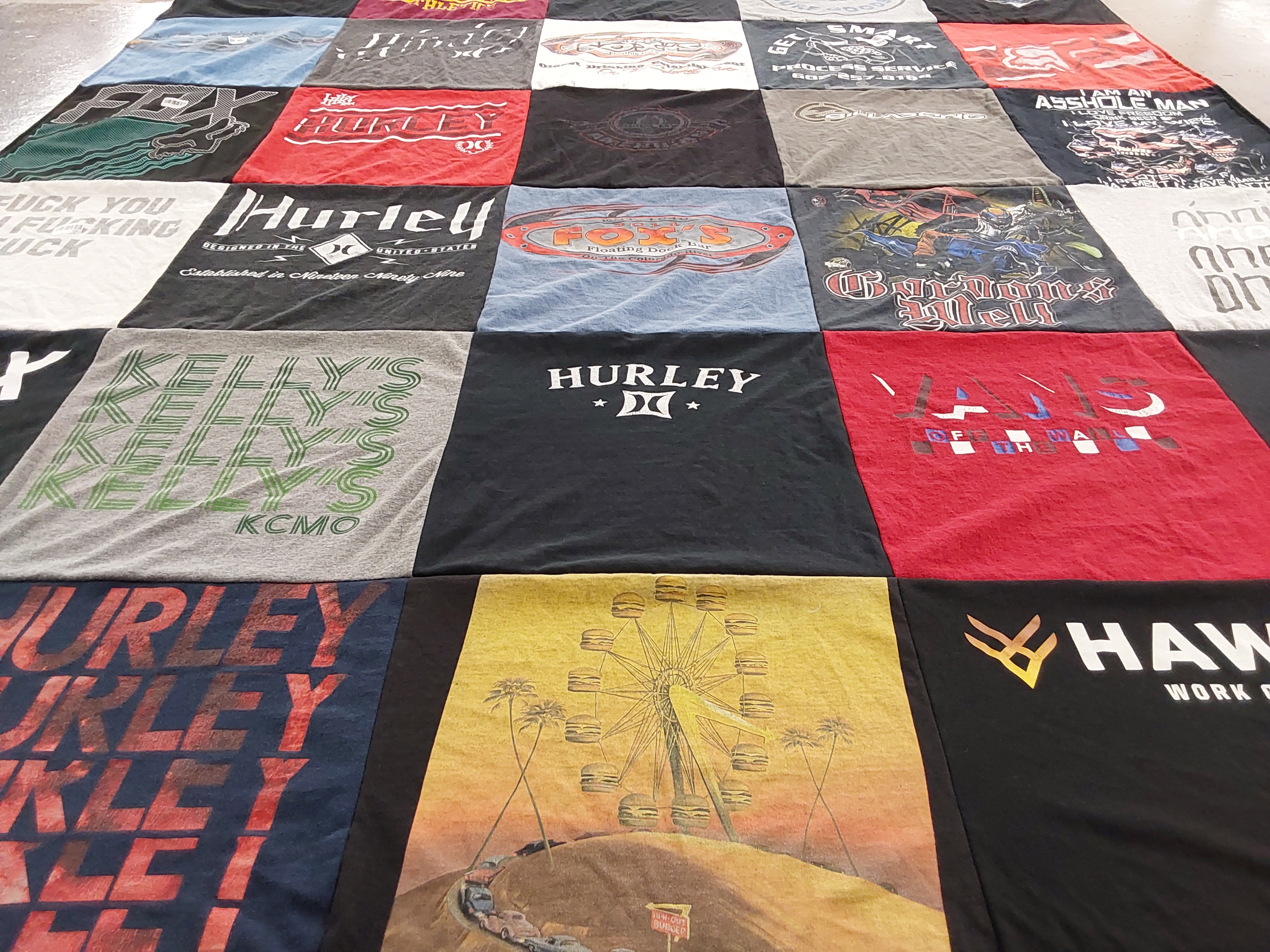 T-shirt quilt with skateboarding, surfing themes by Jody from AZ