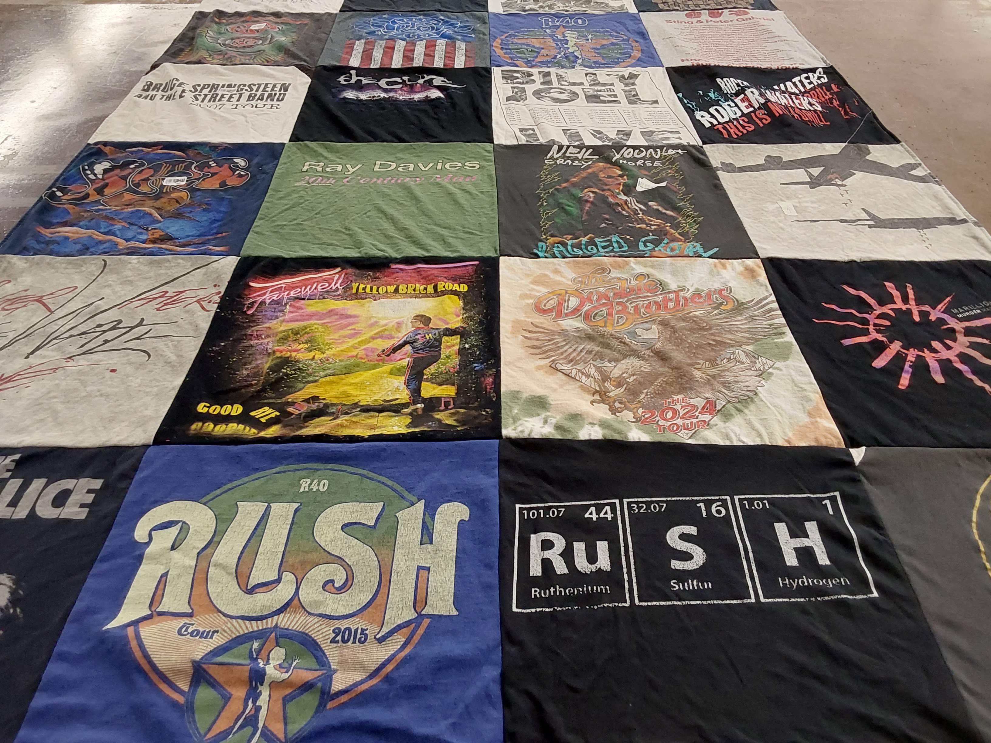 Custom Project Repat t-shirt quilt highlighting music, concerts themes.