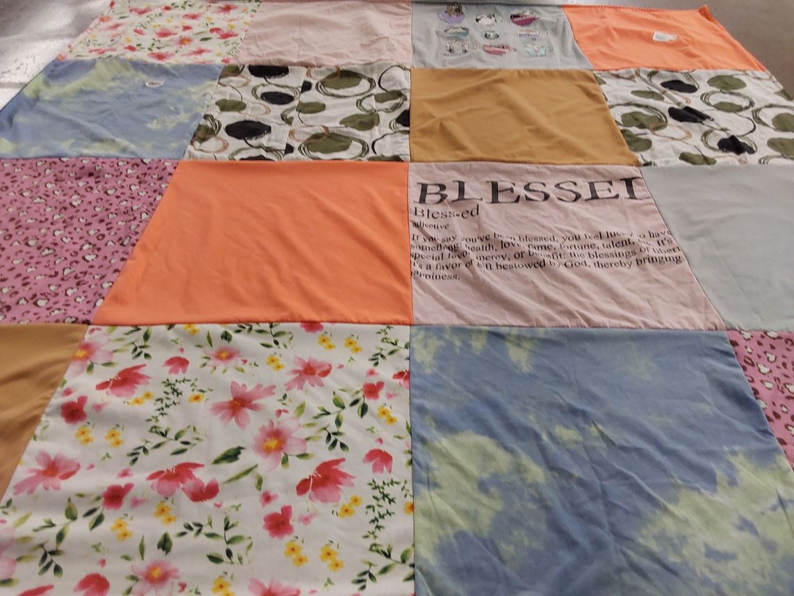 T-shirt quilt with textile arts, crafting themes by Chrystie from NY