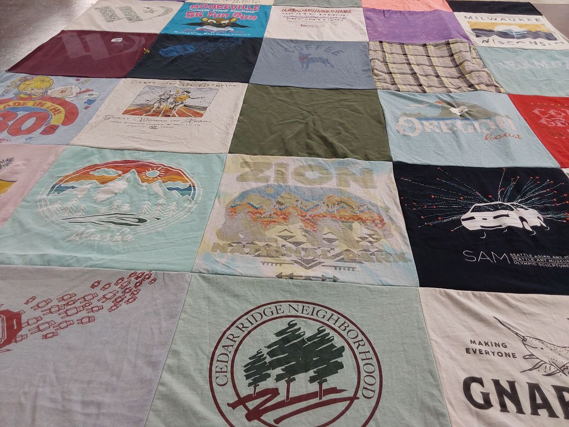 T-shirt quilt with outdoors, traveling themes by Samuel from TX