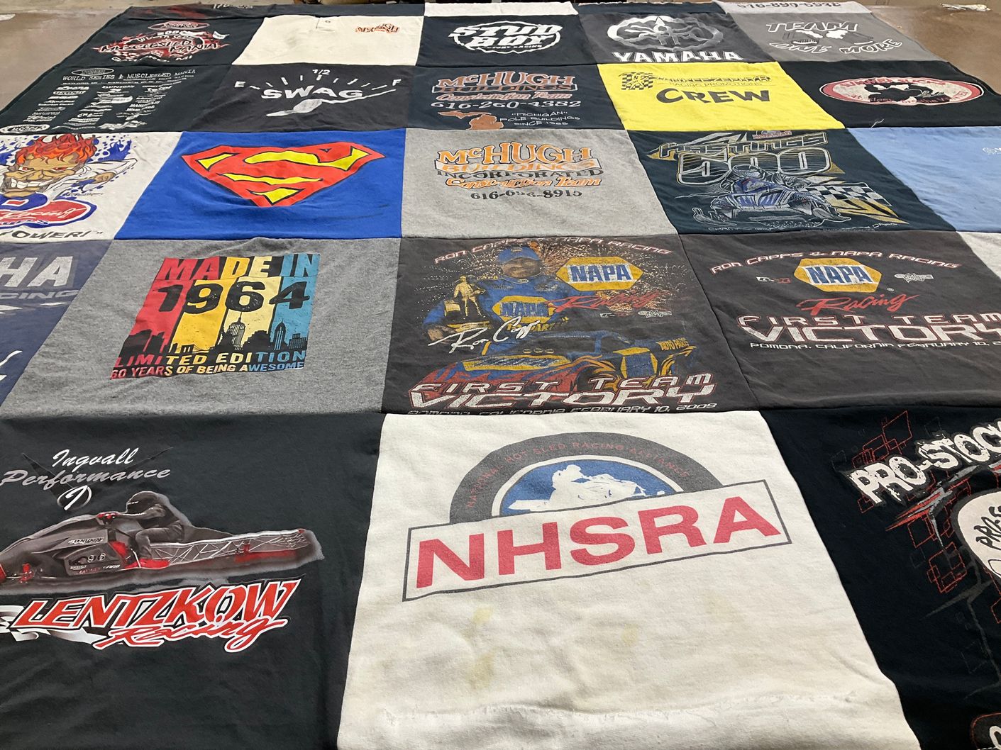 T-shirt quilt featuring mhc high school racing team by Julie from MI
