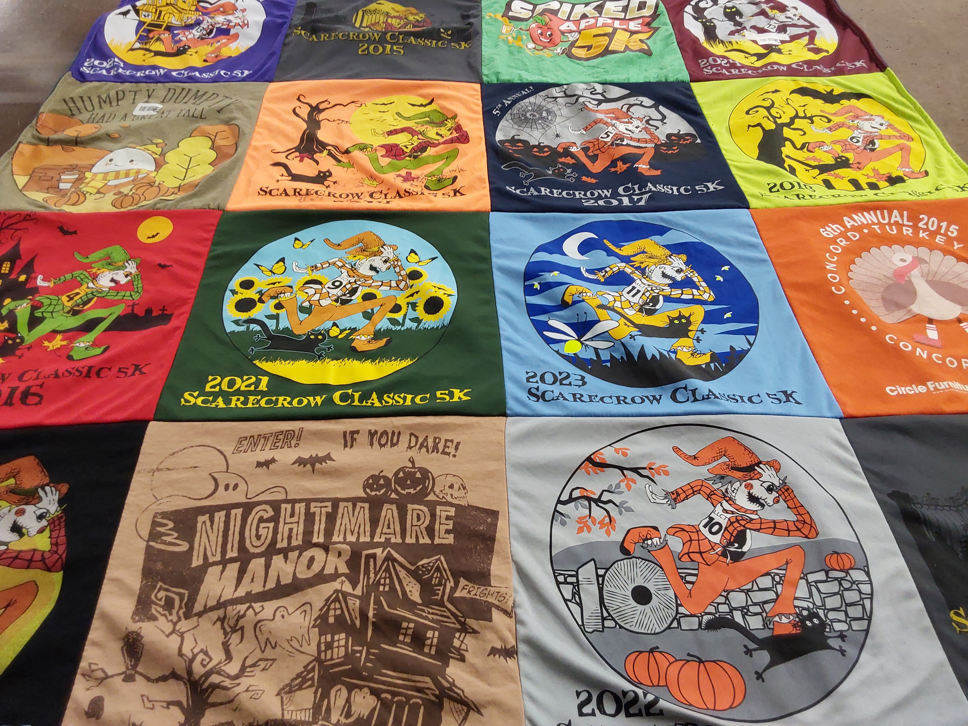 T-shirt quilt with running, halloween themes by Elizabeth from MA
