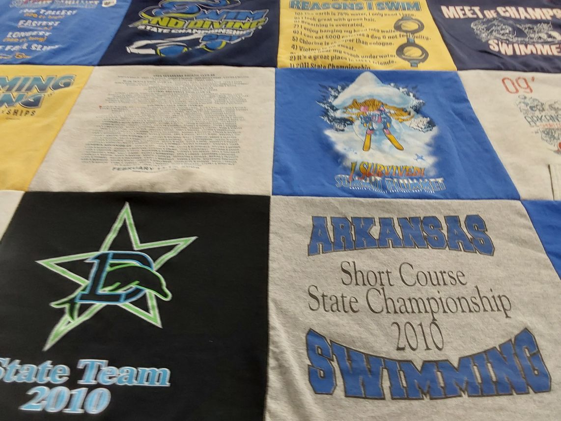 T-shirt quilt featuring dolphin swimming team by Melinda from AR