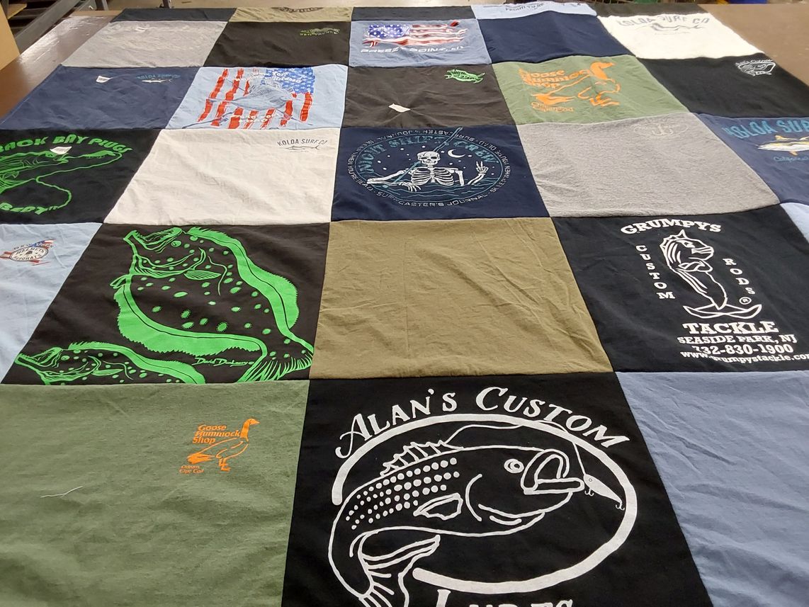 T-shirt quilt with fishing, surfing themes by Eileen from NY