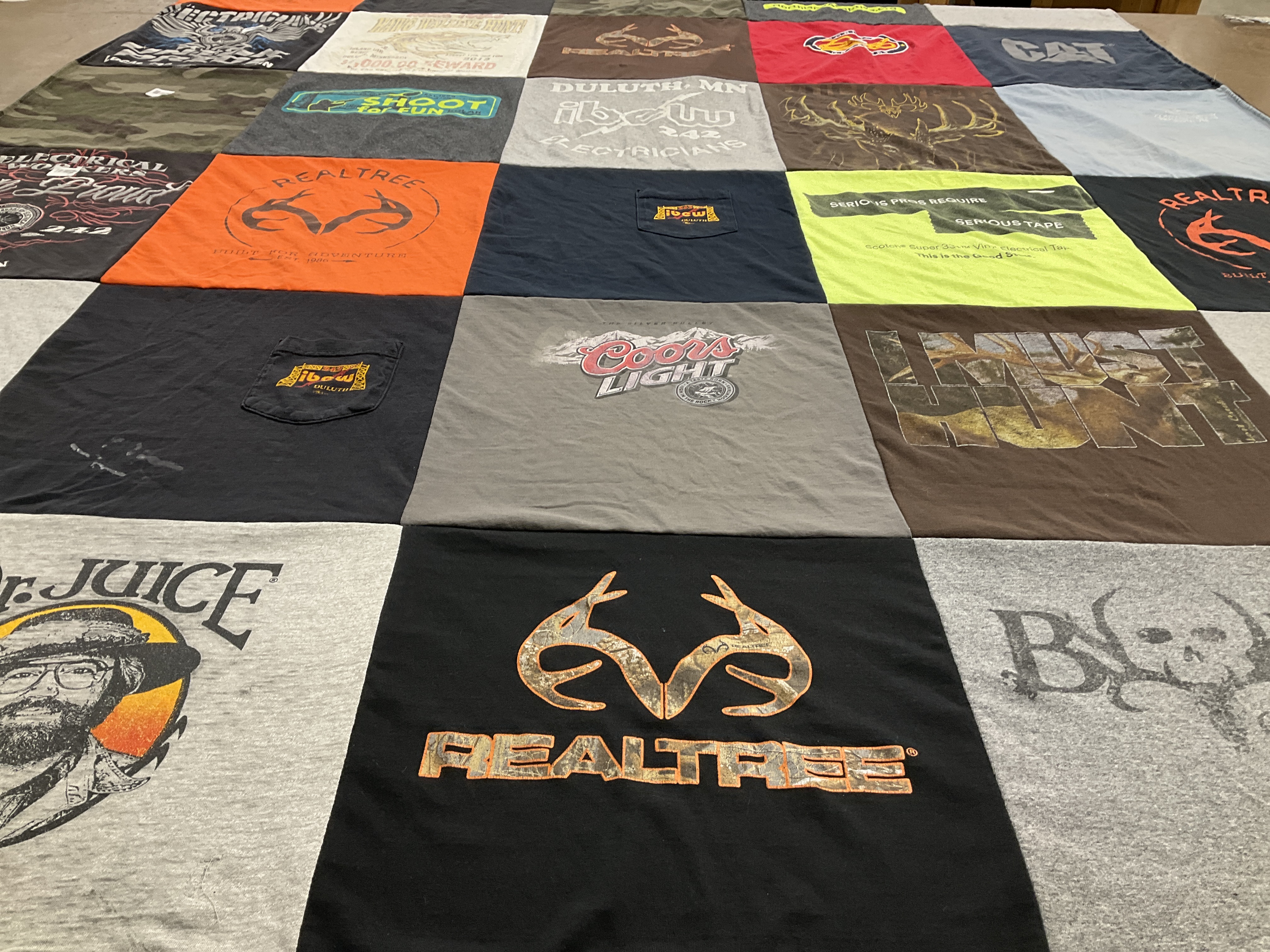 T-shirt quilt with hunting, outdoors themes by Tammy from MN