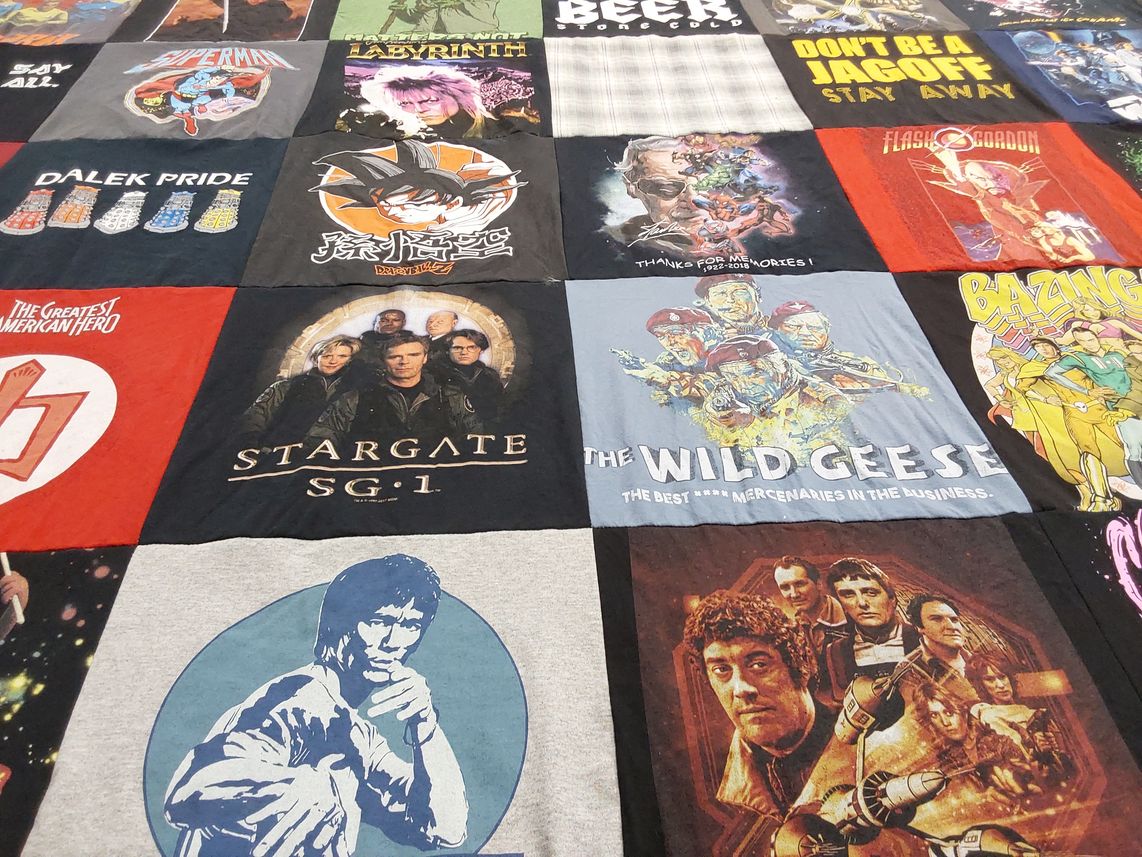 T-shirt quilt with tv shows, comics themes by Jennifer from PA