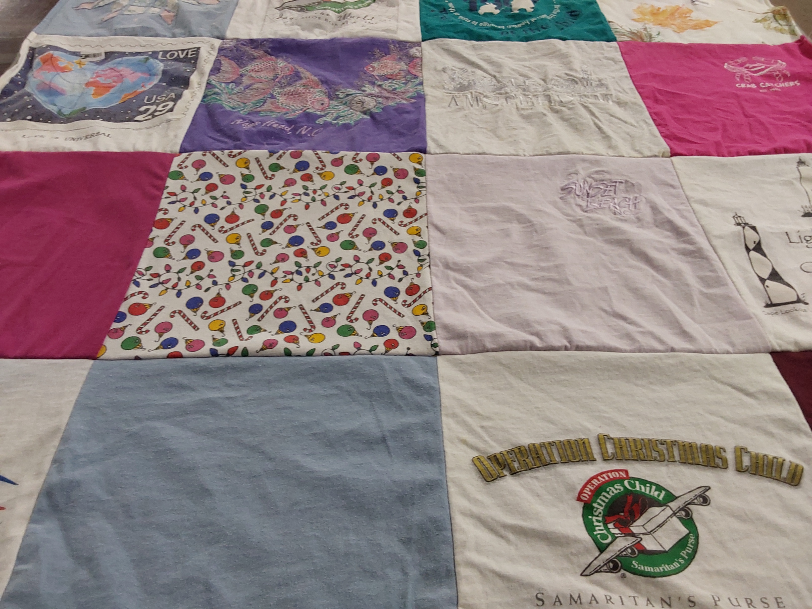 T-shirt quilt with charity, christmas themes by Glenda from NC