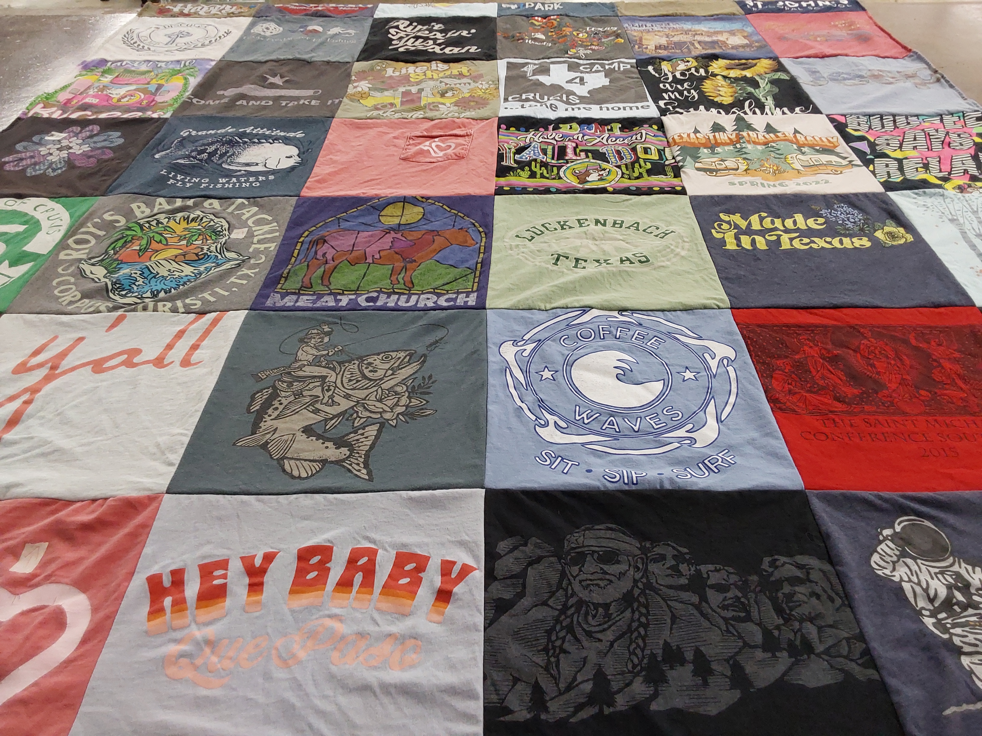 T-shirt quilt with fishing, camping themes by Angela from TX