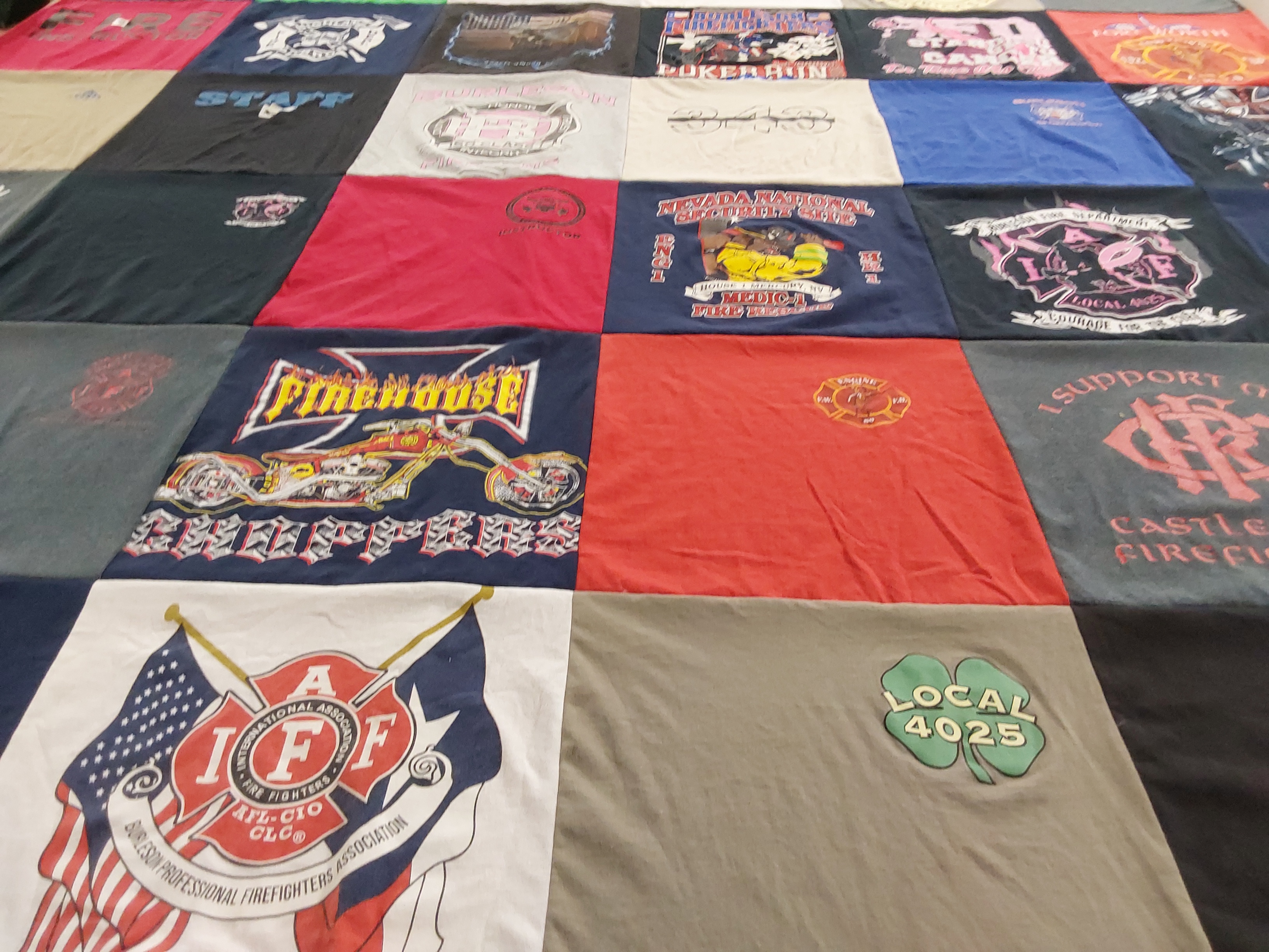T-shirt quilt with firefighting, motorcycles themes by Shannan from TX