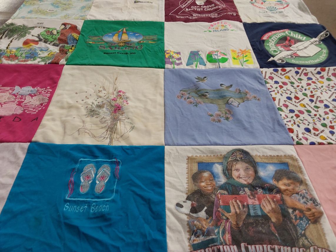 T-shirt quilt with beaches, fishing themes by Glenda from NC