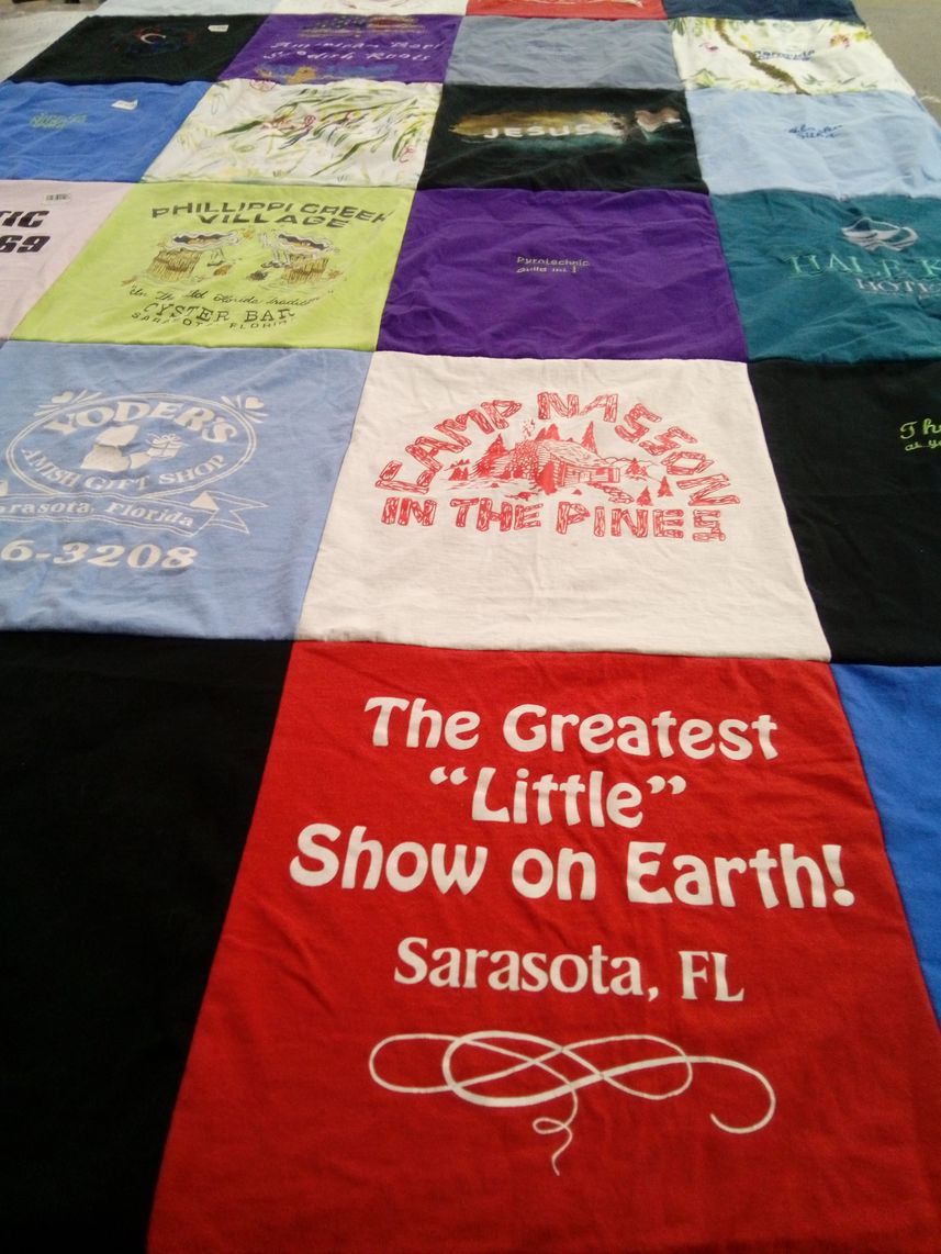 T-shirt quilt with camping, theater themes by Nancy from CT