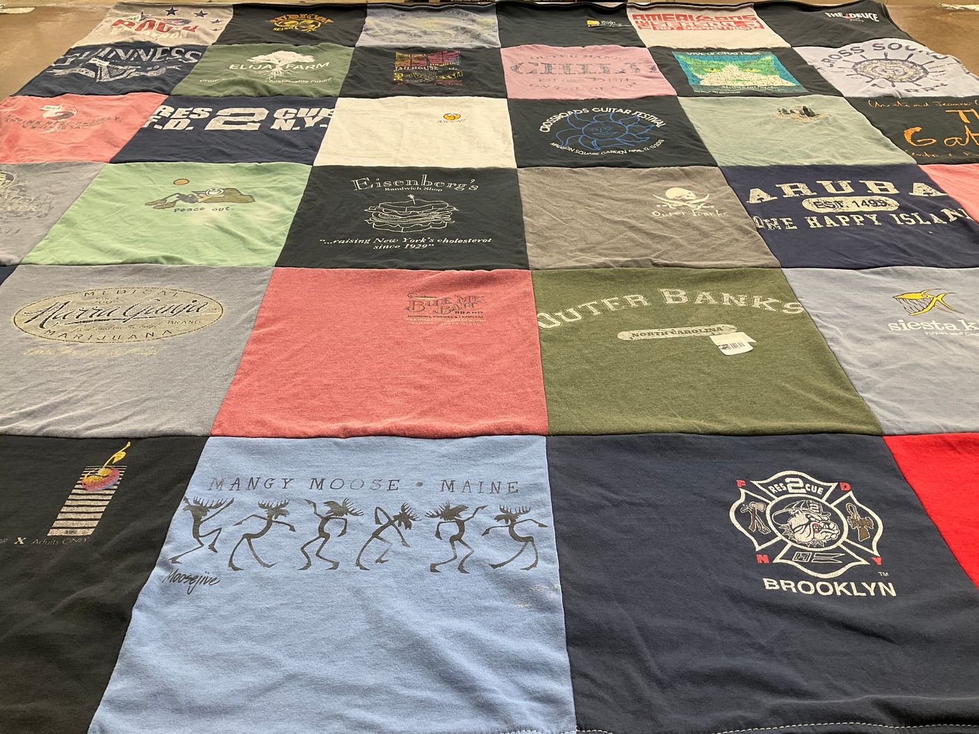 T-shirt quilt with travel, food themes by Douglas from NY