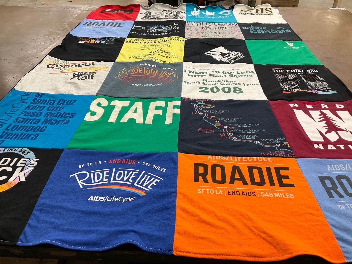T-shirt quilt with aids awareness, charity events themes by Christina from CA