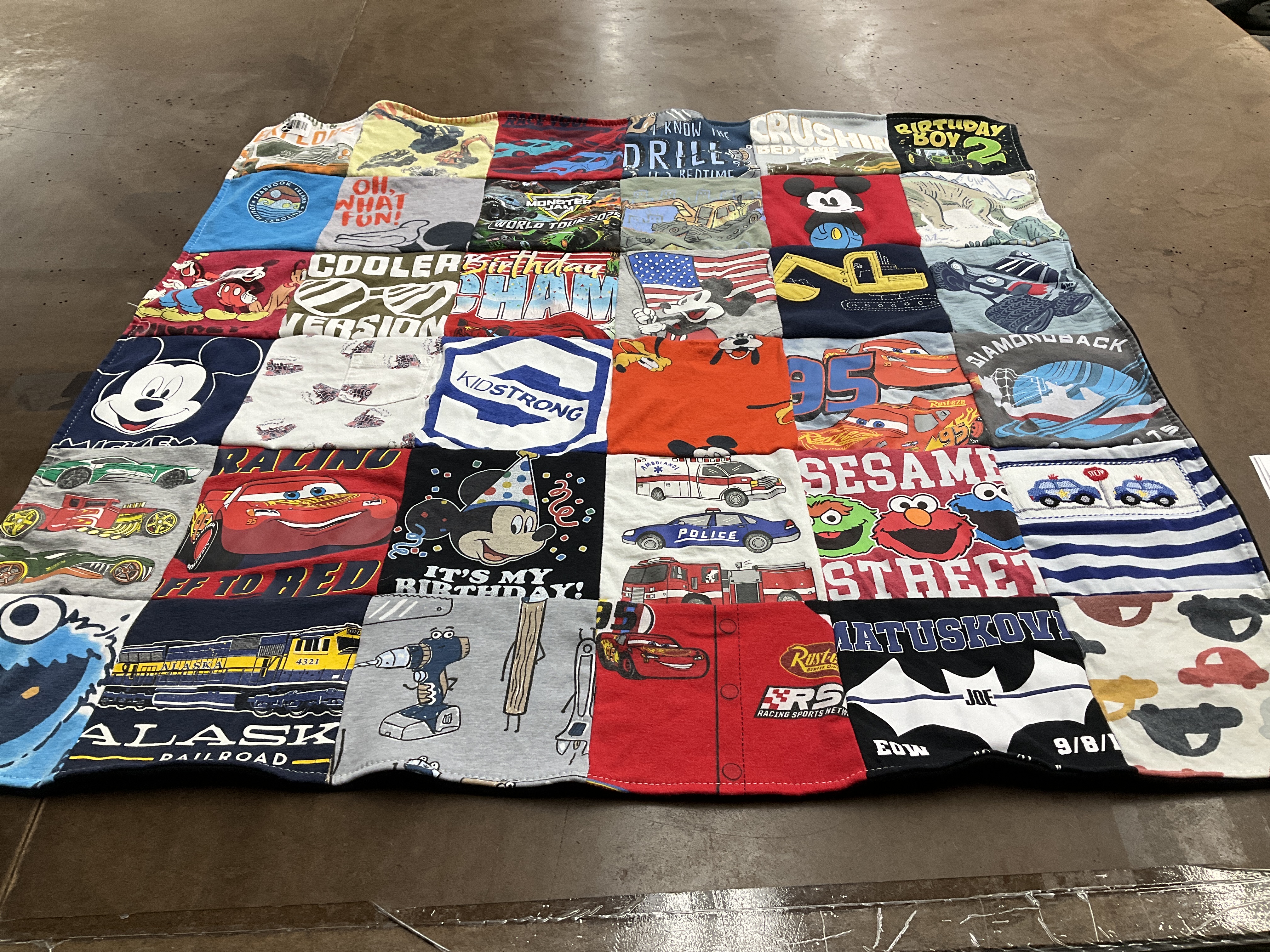 T-shirt quilt with mickey mouse, elmo themes by Beth from SC