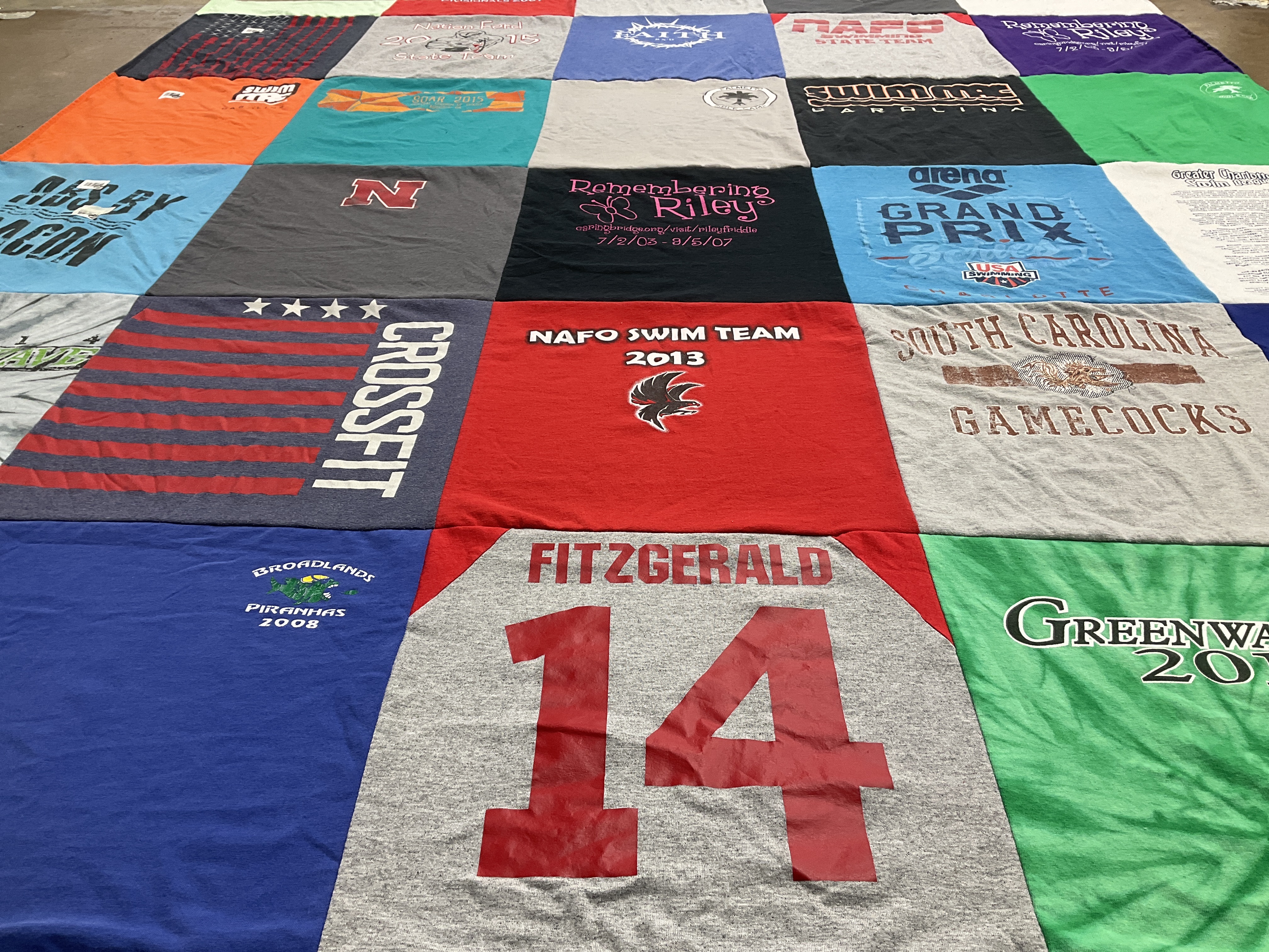 T-shirt quilt with swimming, fitness themes by kim from SC