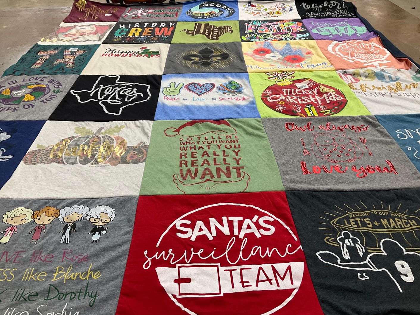 T-shirt quilt with holiday themes, seasonal festivities themes by Monje from TX