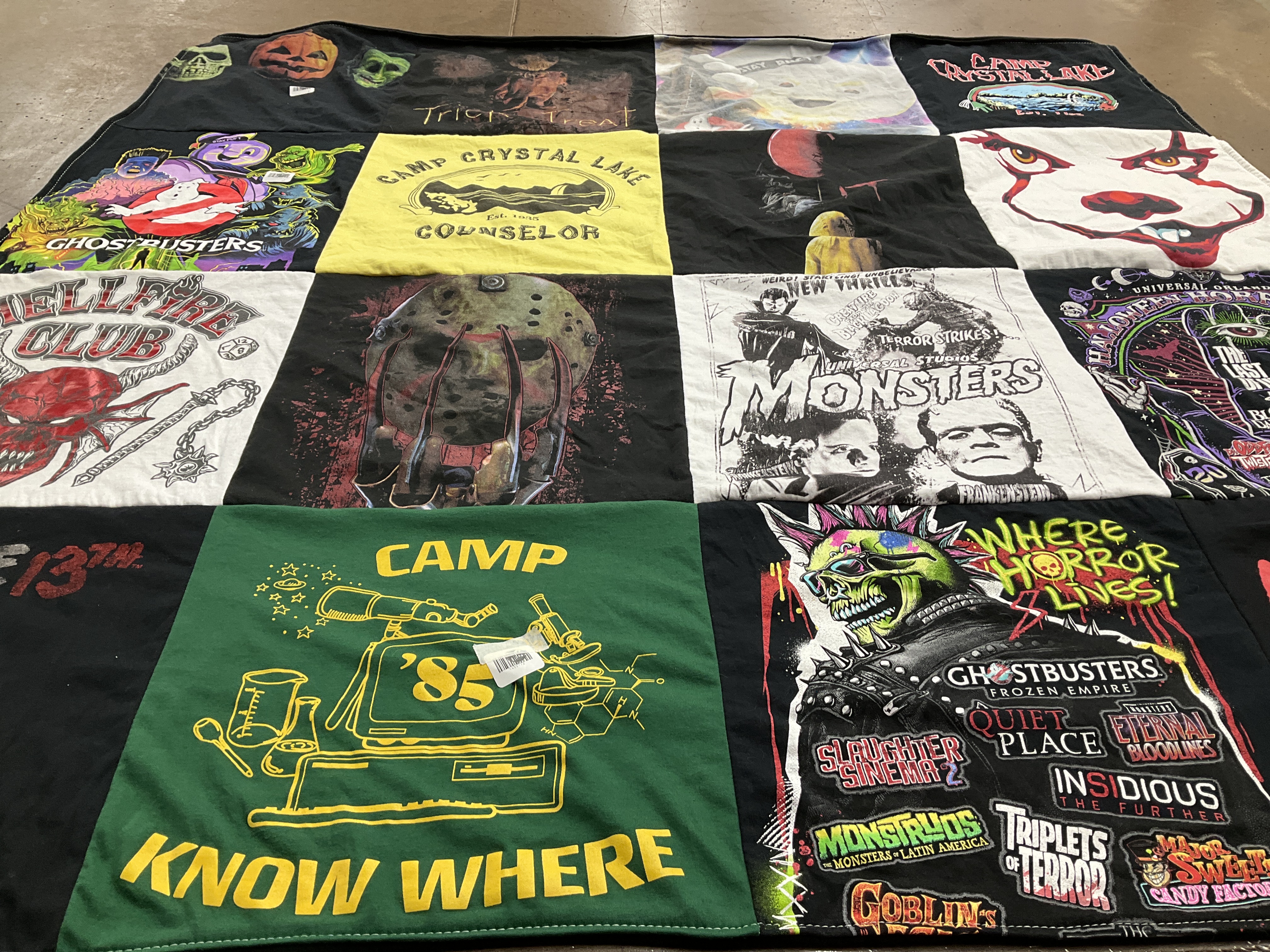 T-shirt quilt with horror movies, camping themes by Jana from KY