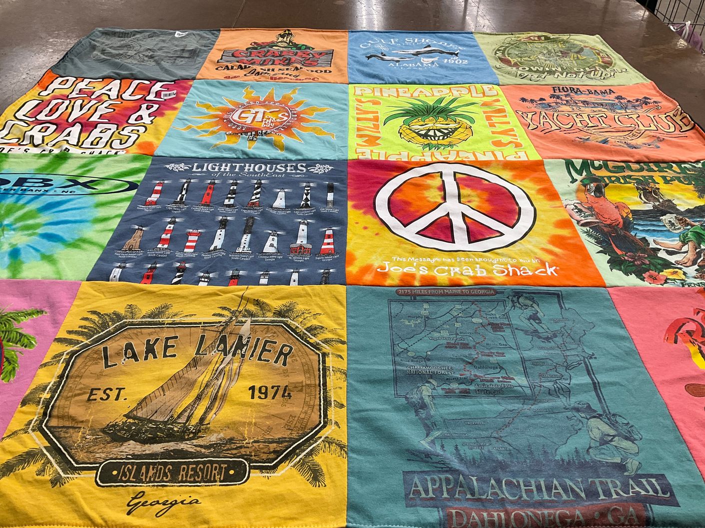 T-shirt quilt with beach, fishing themes by Catherine from GA