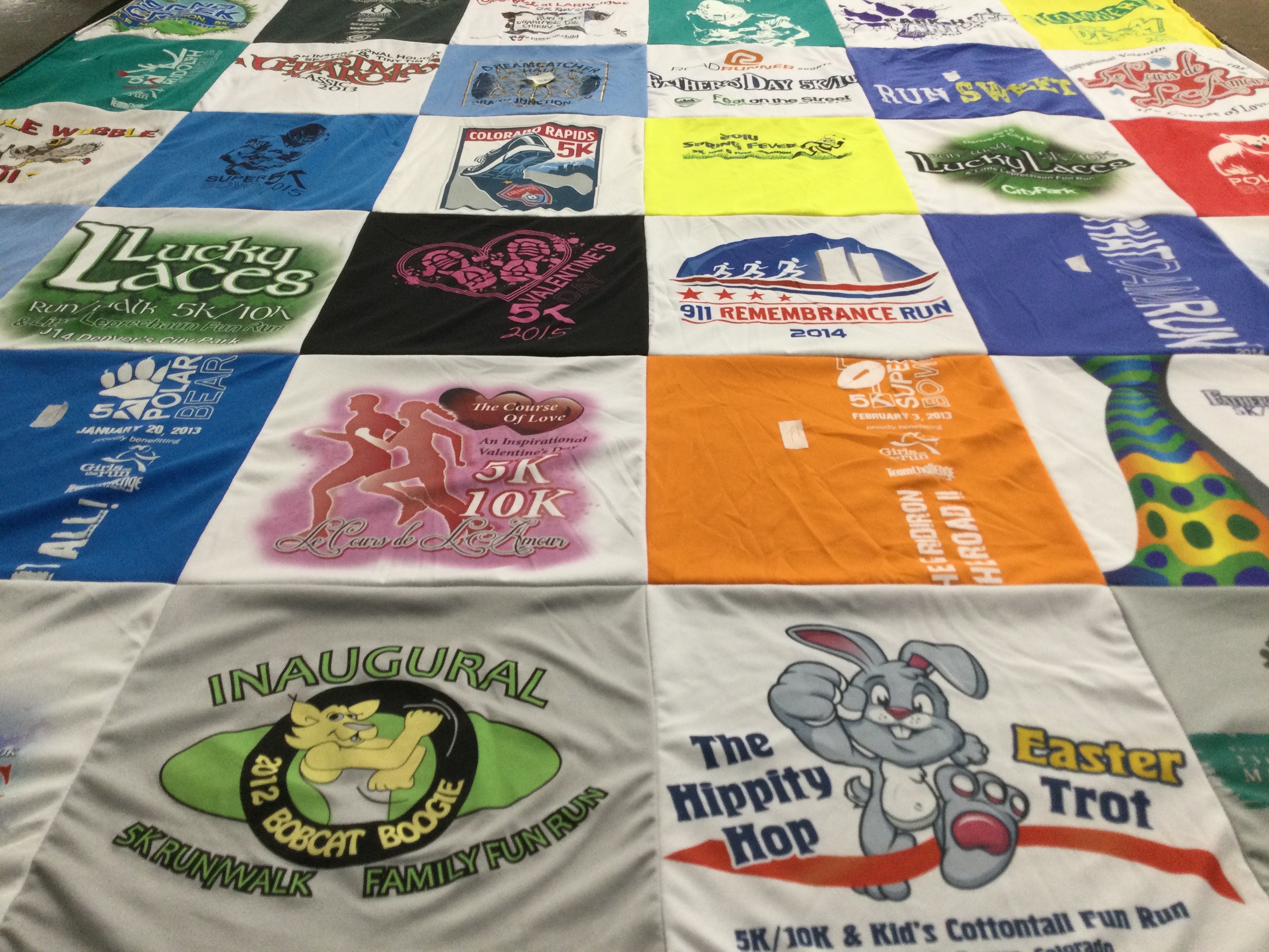 T-shirt quilt with running, events themes by Barbara from CO