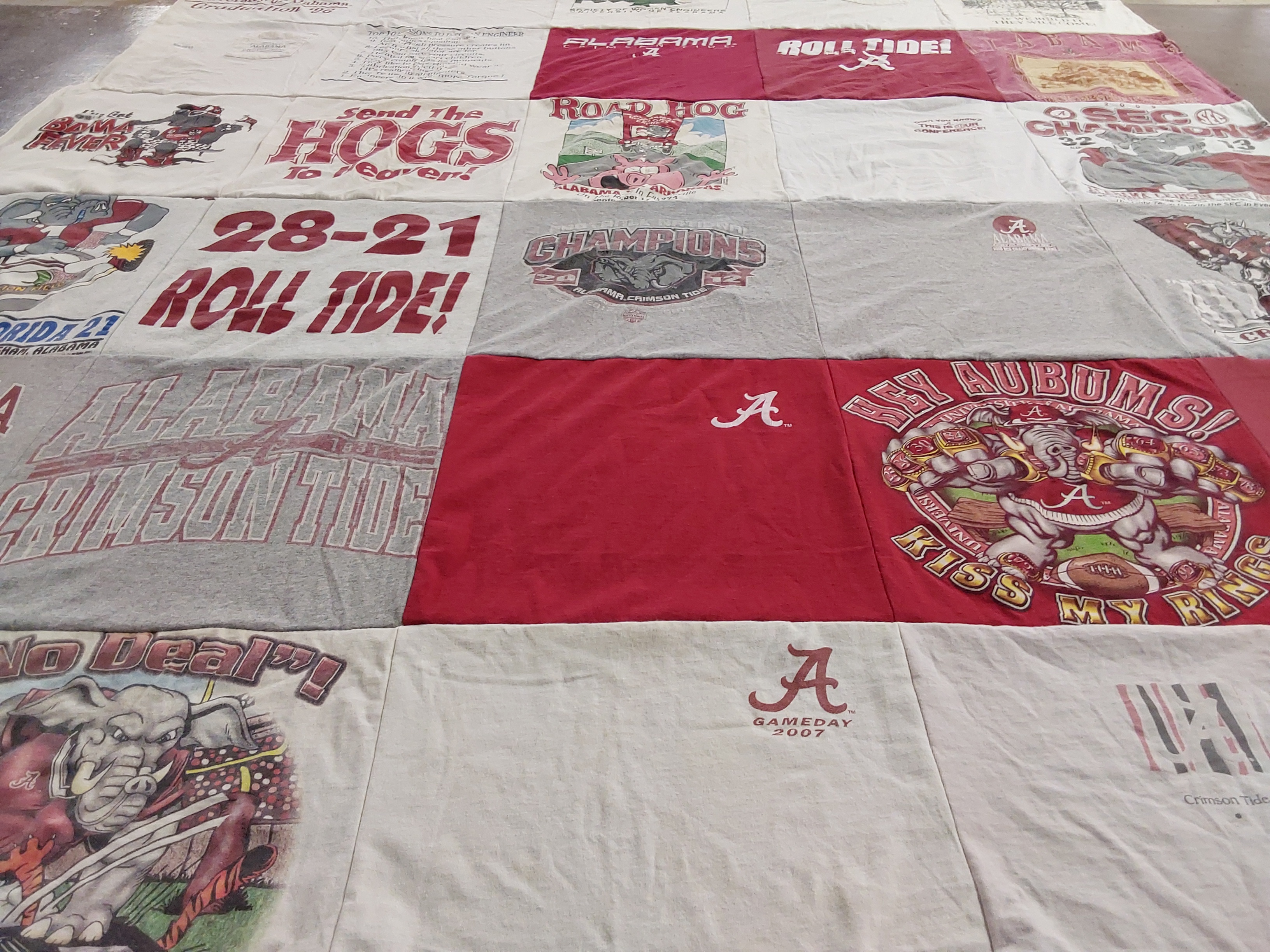 T-shirt quilt featuring university of alabama, auburn university by Tracy from AL