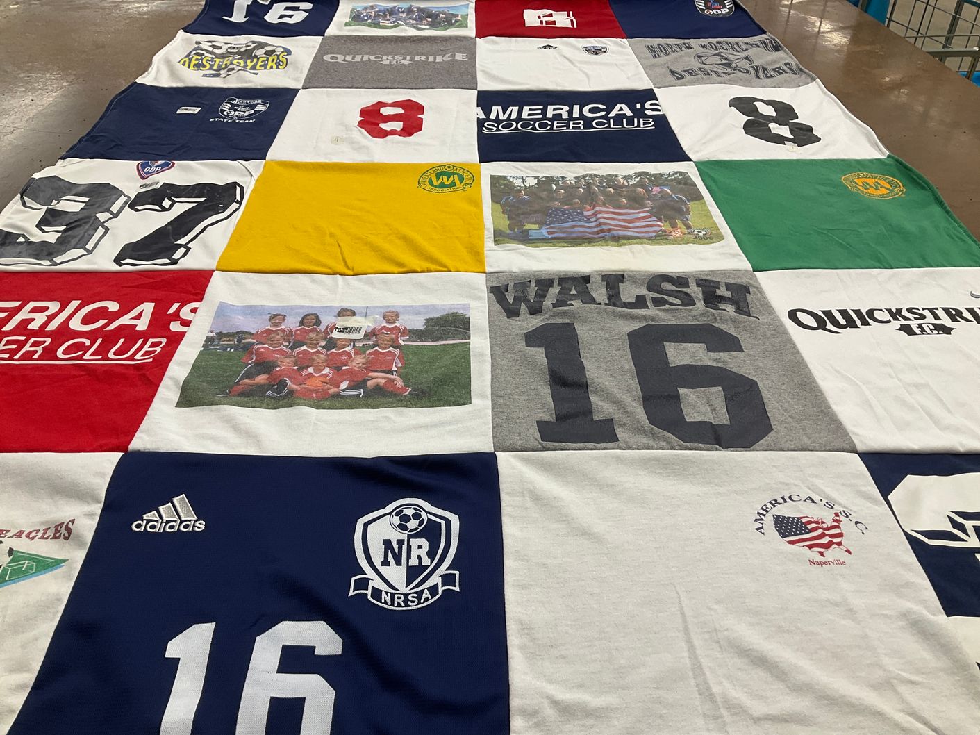 T-shirt quilt with sports, soccer themes by kathleen from NY