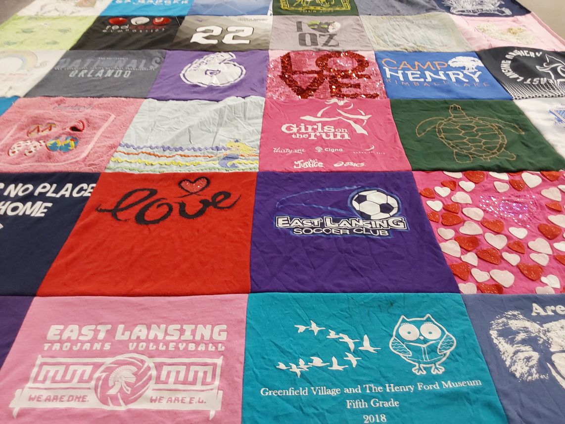 T-shirt quilt featuring east lansing trojans volleyball, east lansing soccer club by Victoria from MI