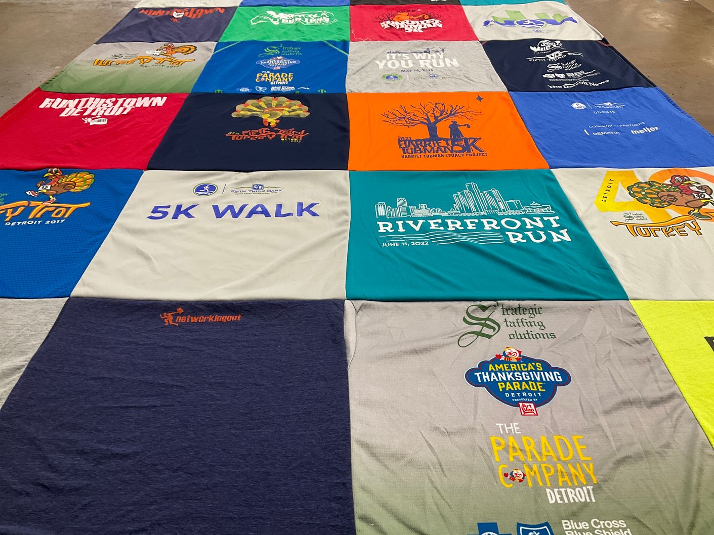T-shirt quilt with running, parades themes by Crystal from MI