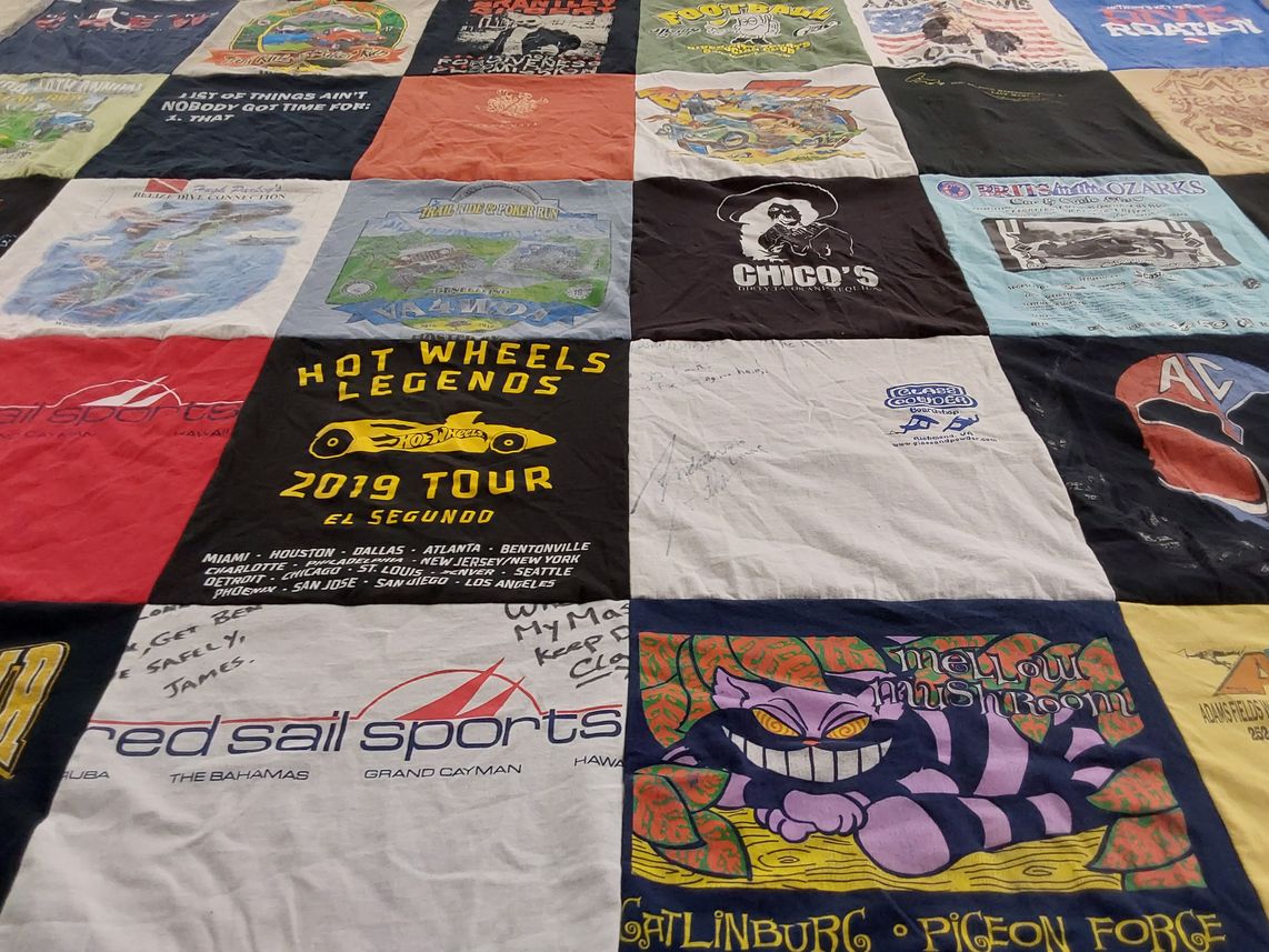 T-shirt quilt with sports, travel themes by Deborah from FL