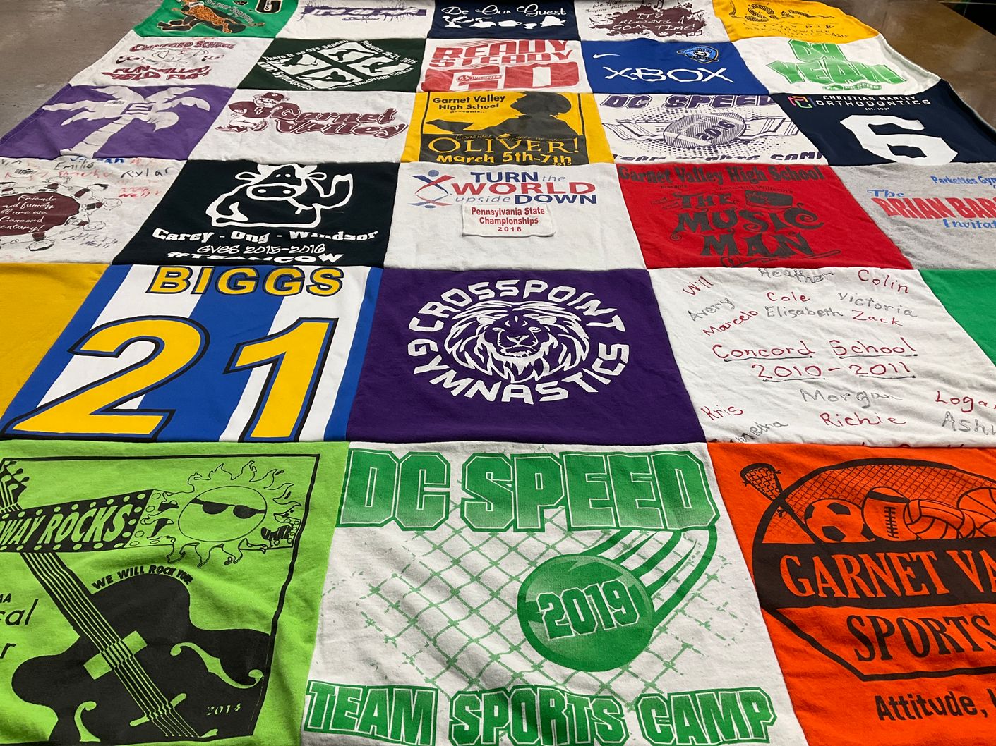 T-shirt quilt featuring crosspoint gymnastics, dc speed by Colleen from WA