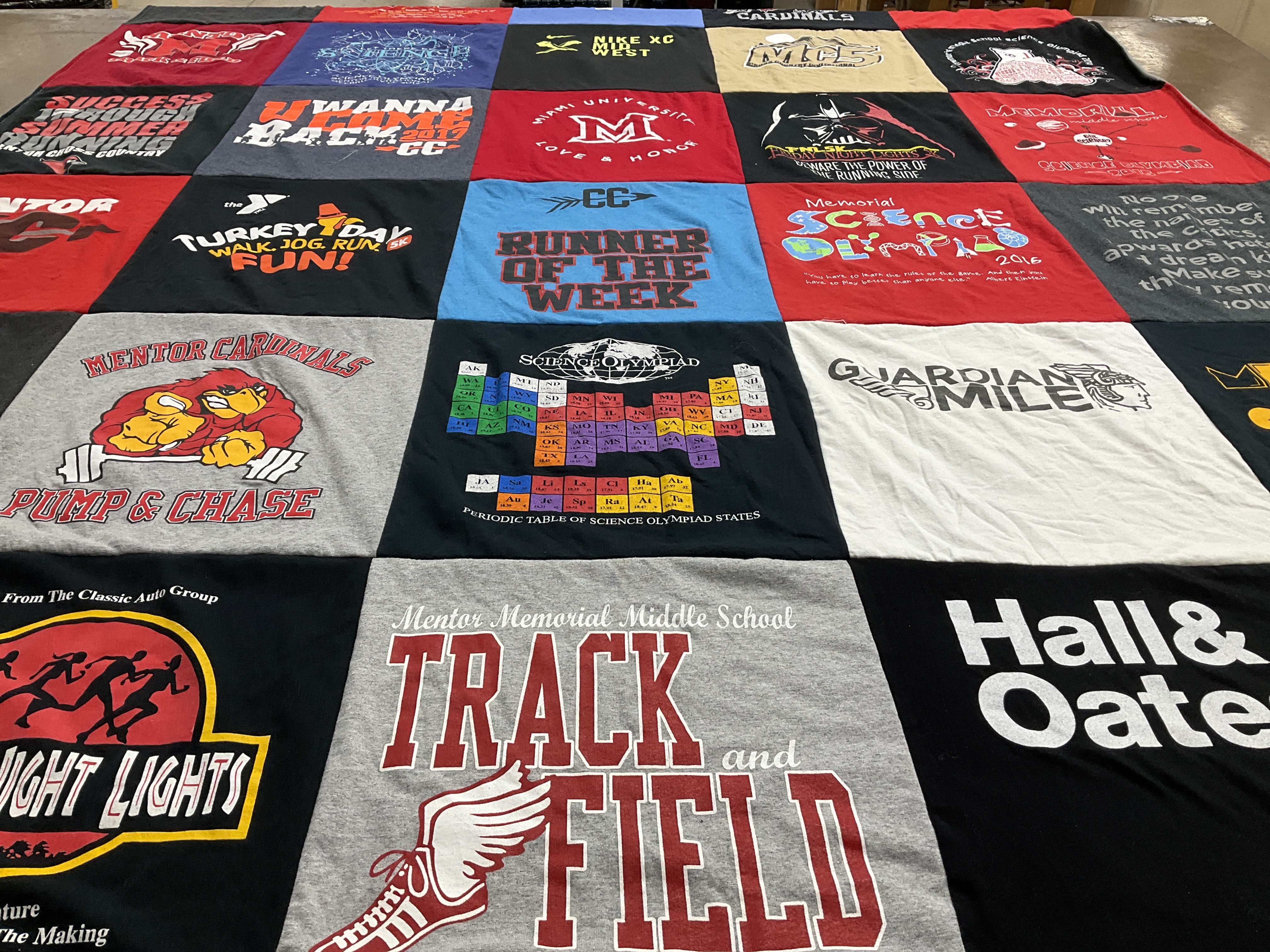 Custom Project Repat t-shirt quilt featuring shirts from mentor memorial middle school.