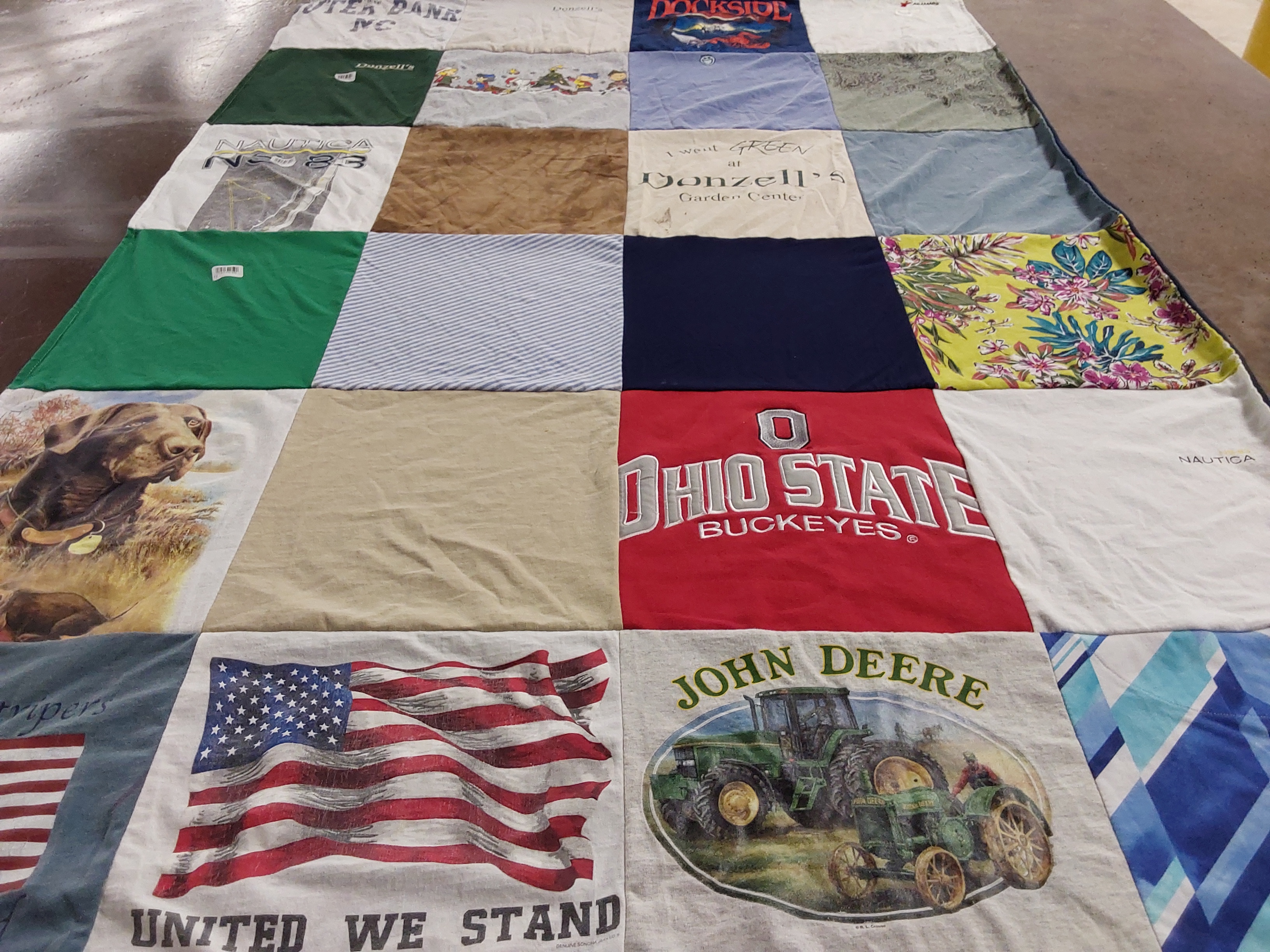 Custom Project Repat t-shirt quilt featuring shirts from ohio state university.