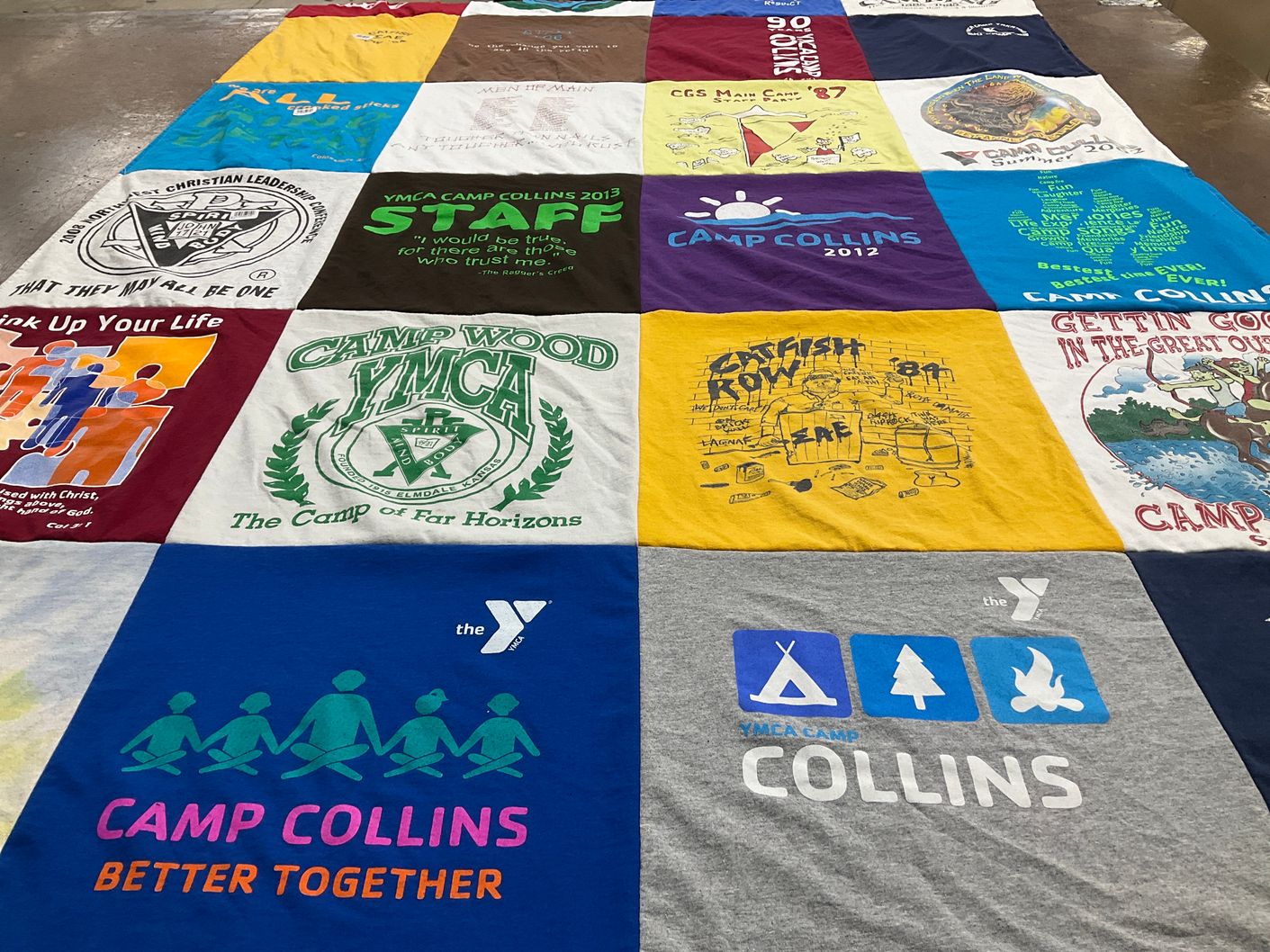 T-shirt quilt with camping, community themes by Willard from OR