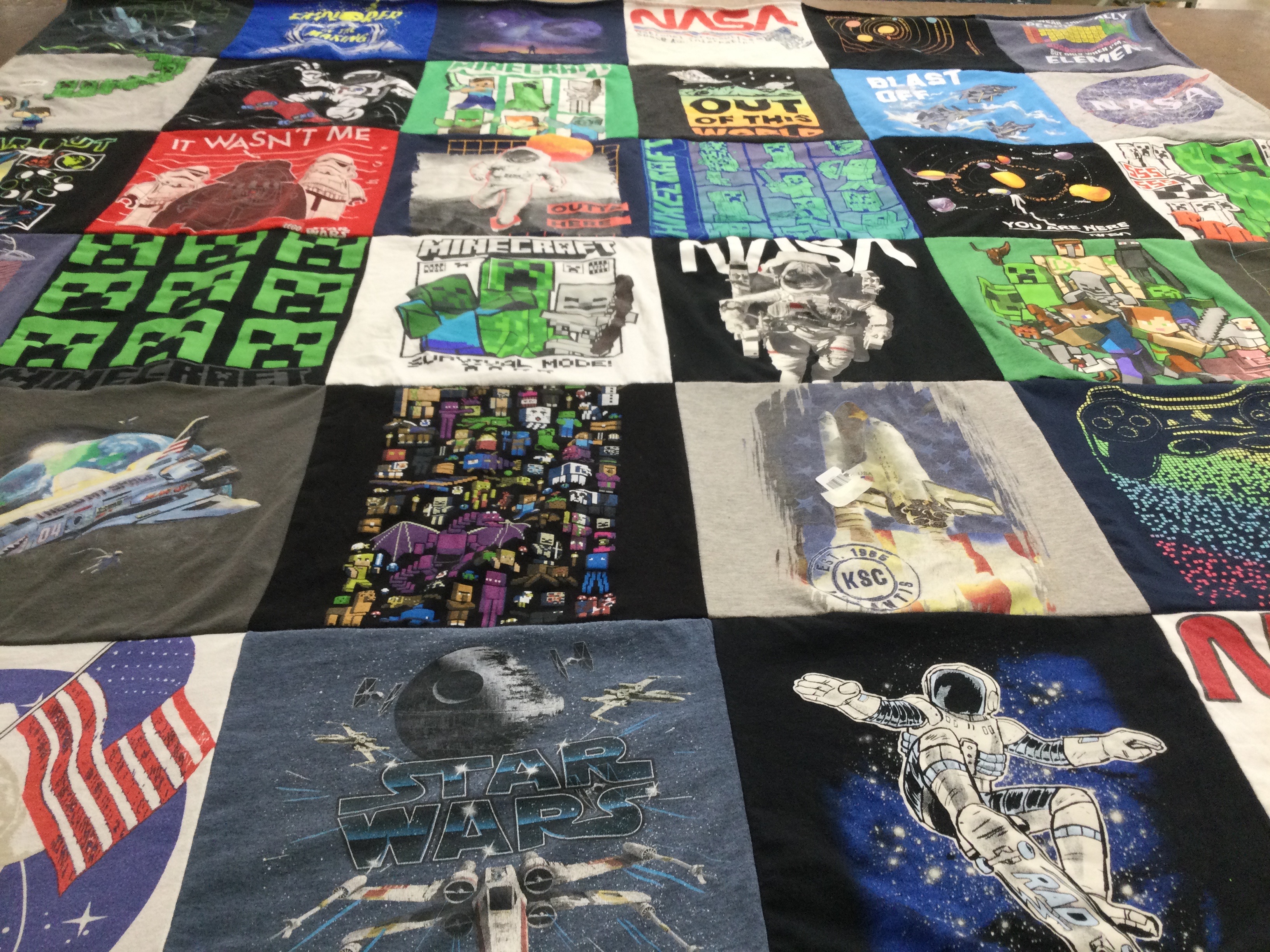 T-shirt quilt with space, video games themes by Robin from NH