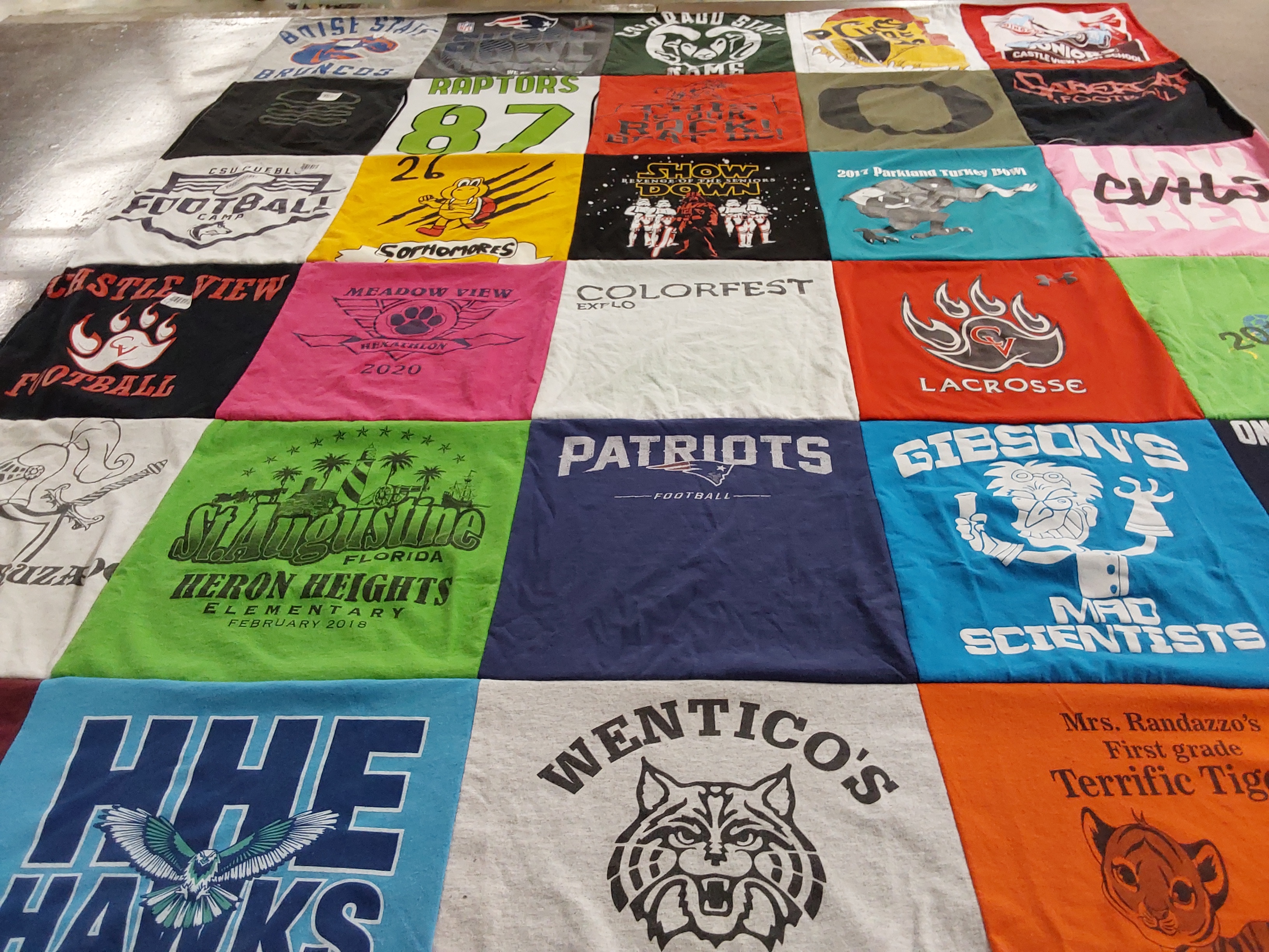 T-shirt quilt featuring patriots football team, raptors sports team by Jami from CO