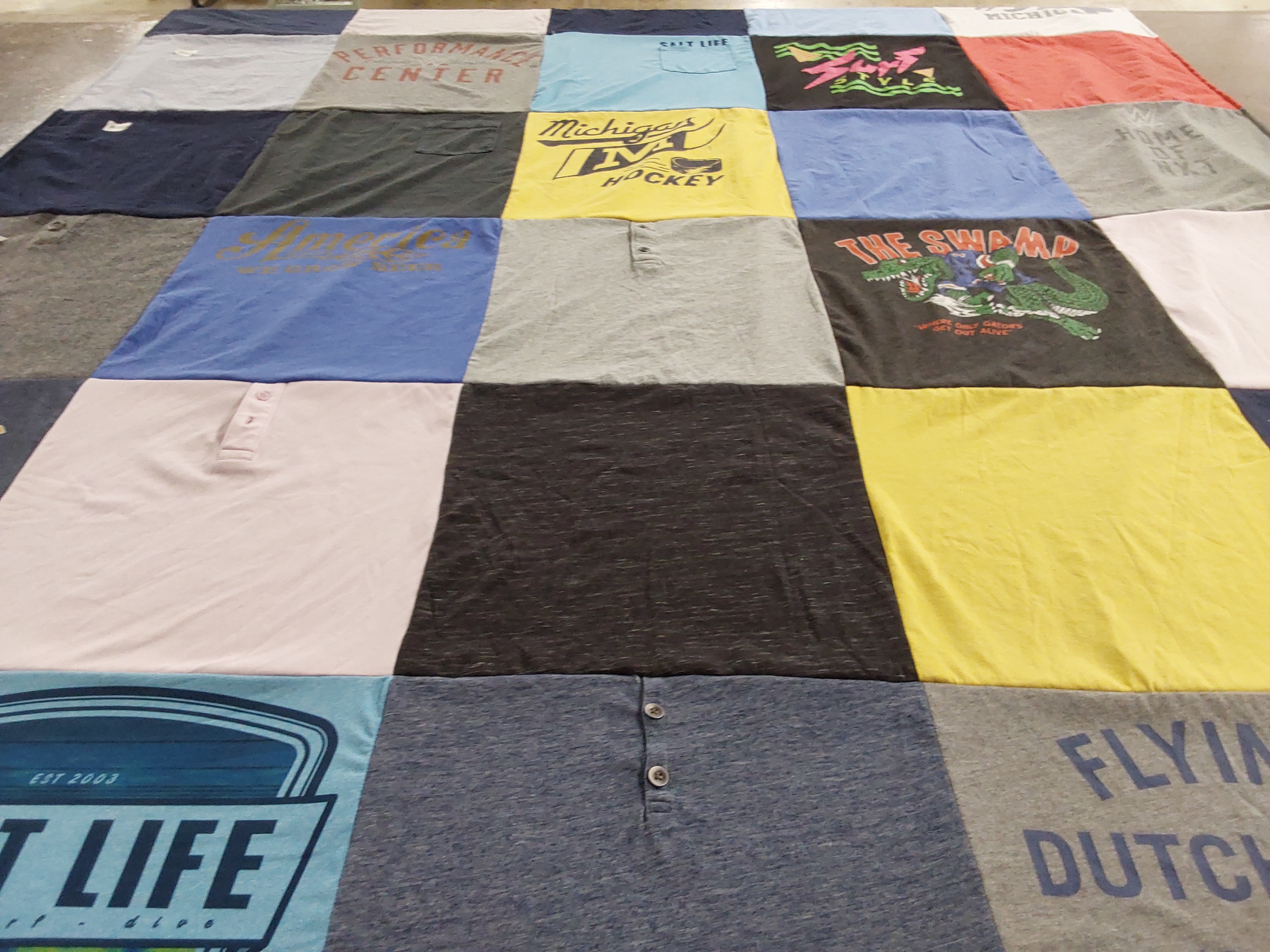 T-shirt quilt with sports, outdoors themes by Lauren from IL
