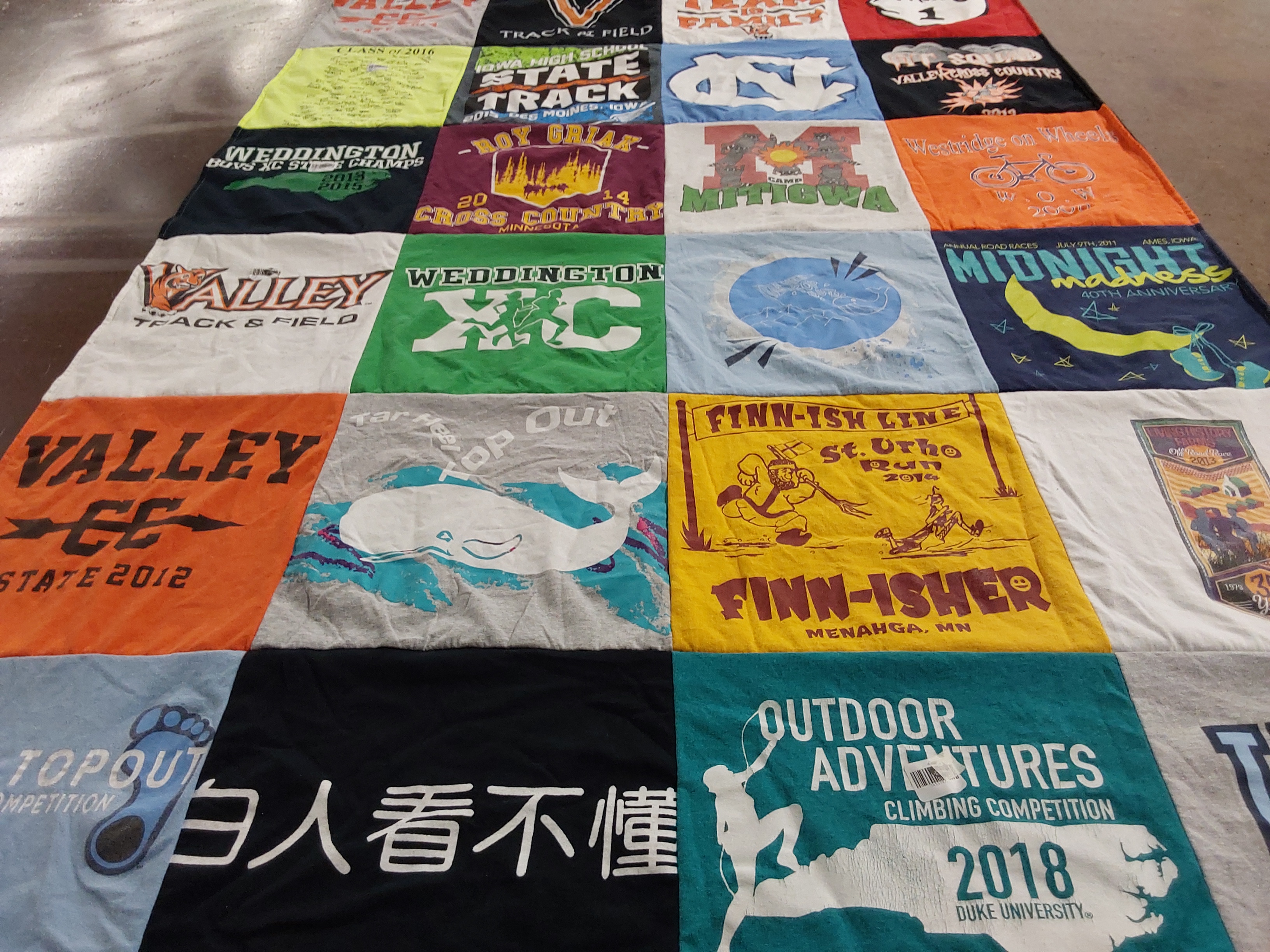 Custom Project Repat t-shirt quilt featuring shirts from duke university.
