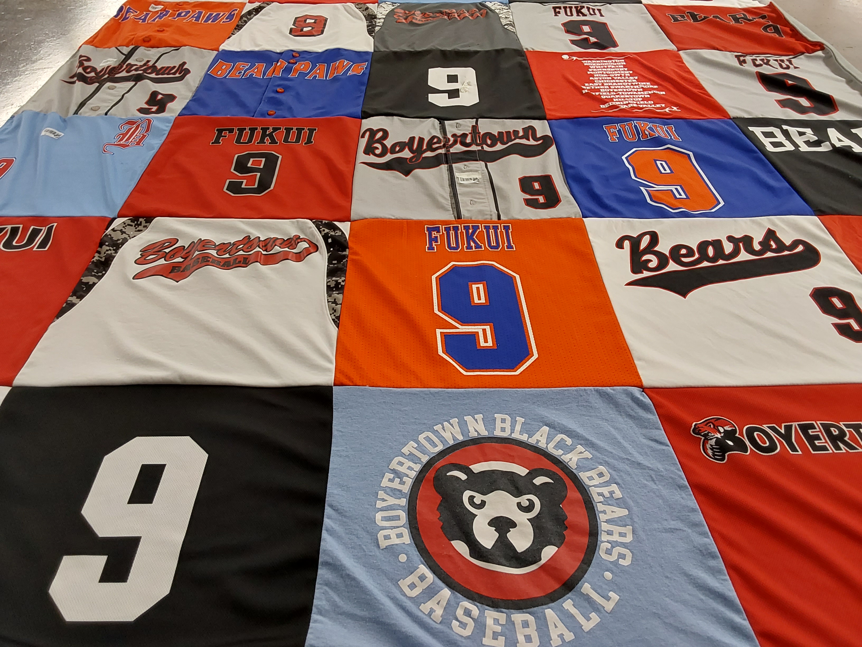 Custom Project Repat t-shirt quilt featuring shirts from boyertown.