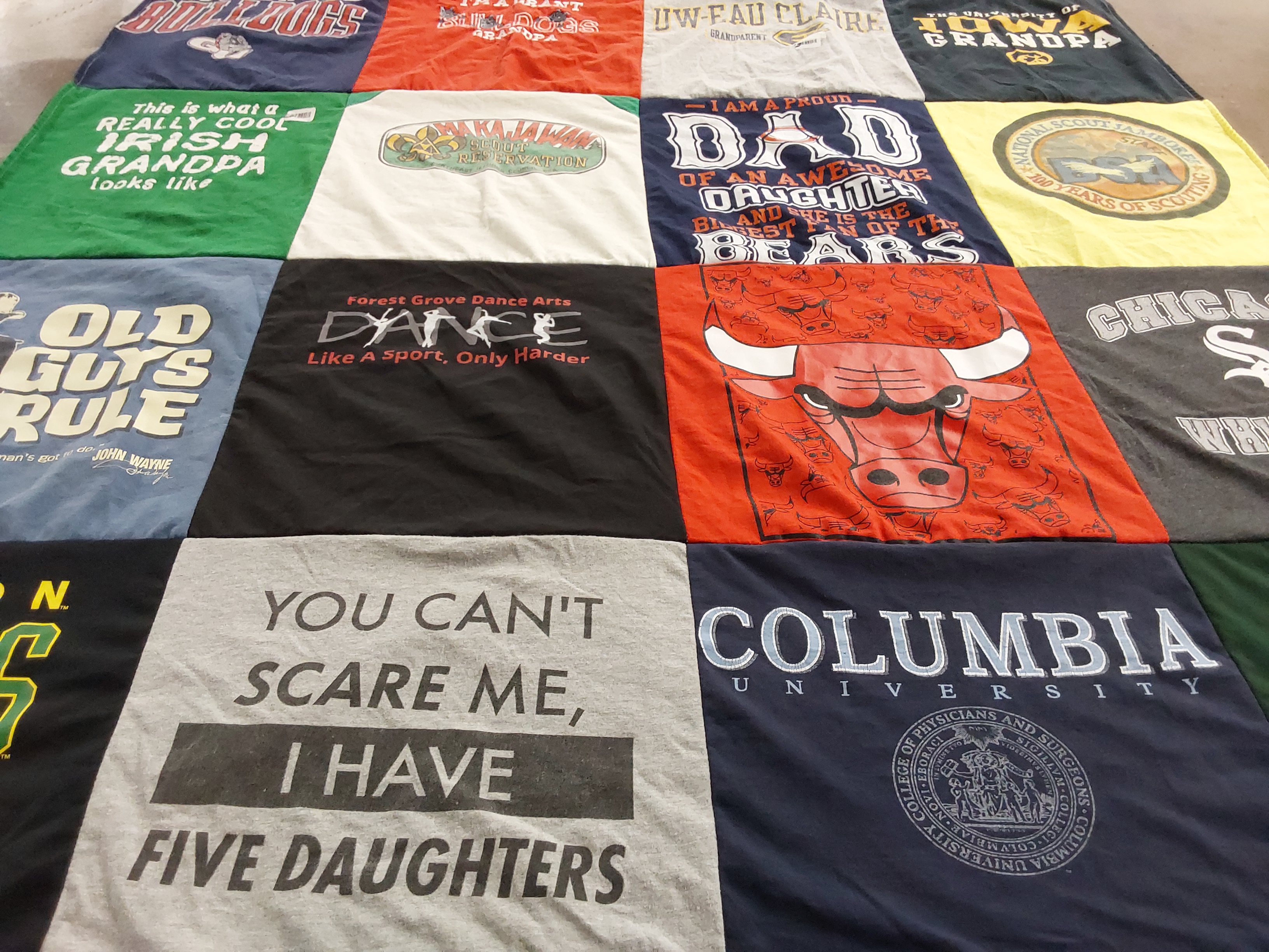 Custom Project Repat t-shirt quilt featuring shirts from columbia university, uw-eau claire.