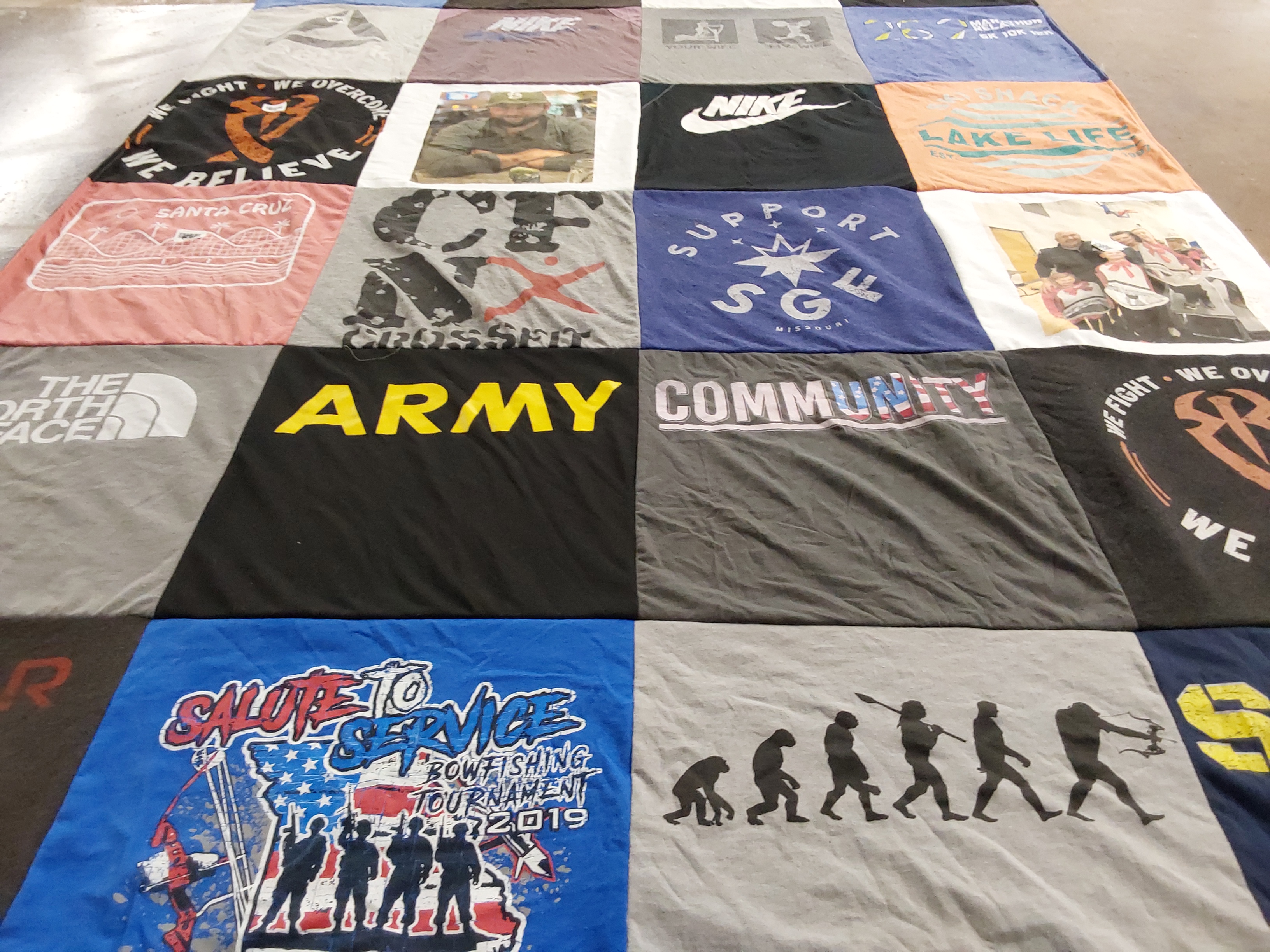 T-shirt quilt with fishing, sports themes by Natalie from MO