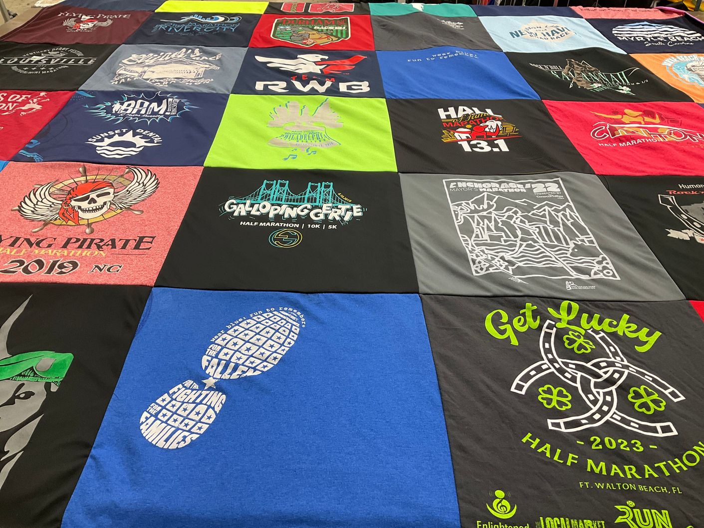 T-shirt quilt with running, marathons themes by Anita from NC