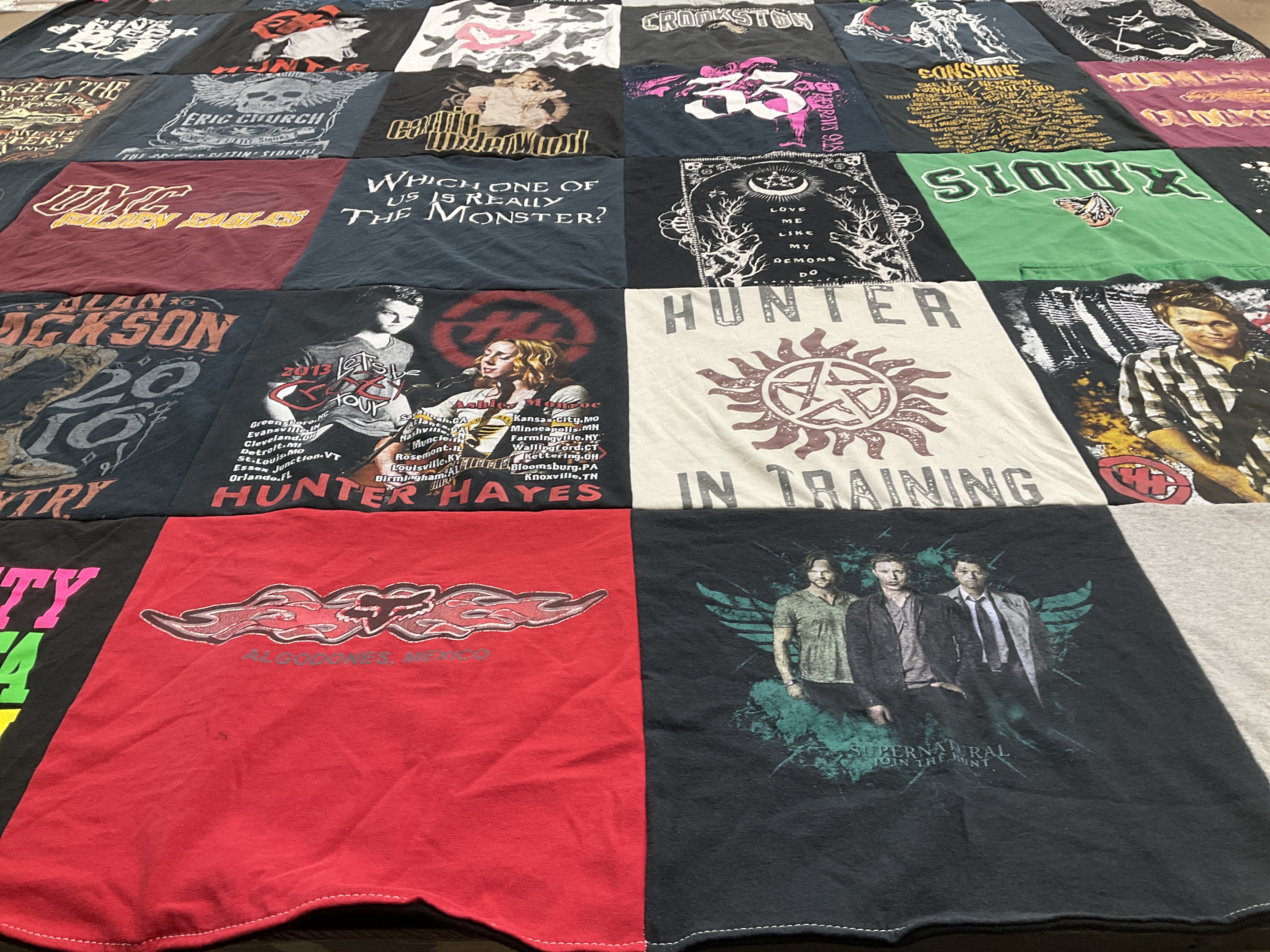 T-shirt quilt with country music, hunting themes by Jessica from MN