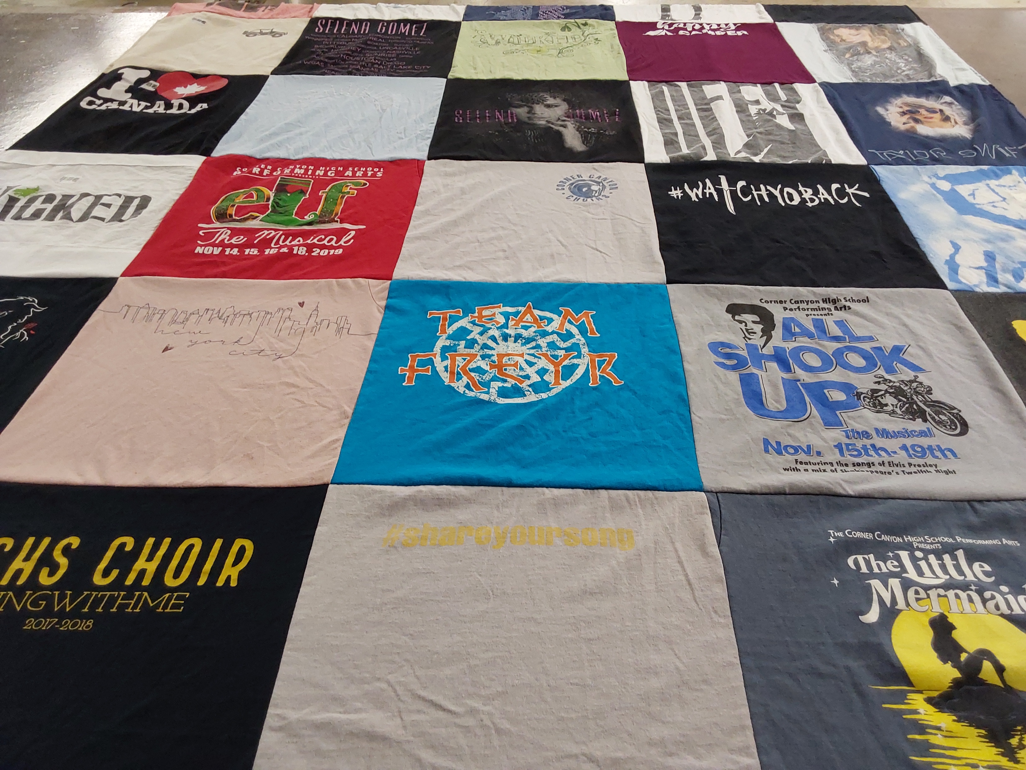 Custom Project Repat t-shirt quilt featuring shirts from corner canyon high school.